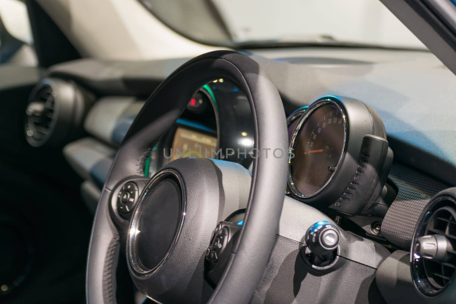 Zoom at sports car console with steering wheel in Car show event at Bangkok, Thailand. This a open event no need press credentials required.