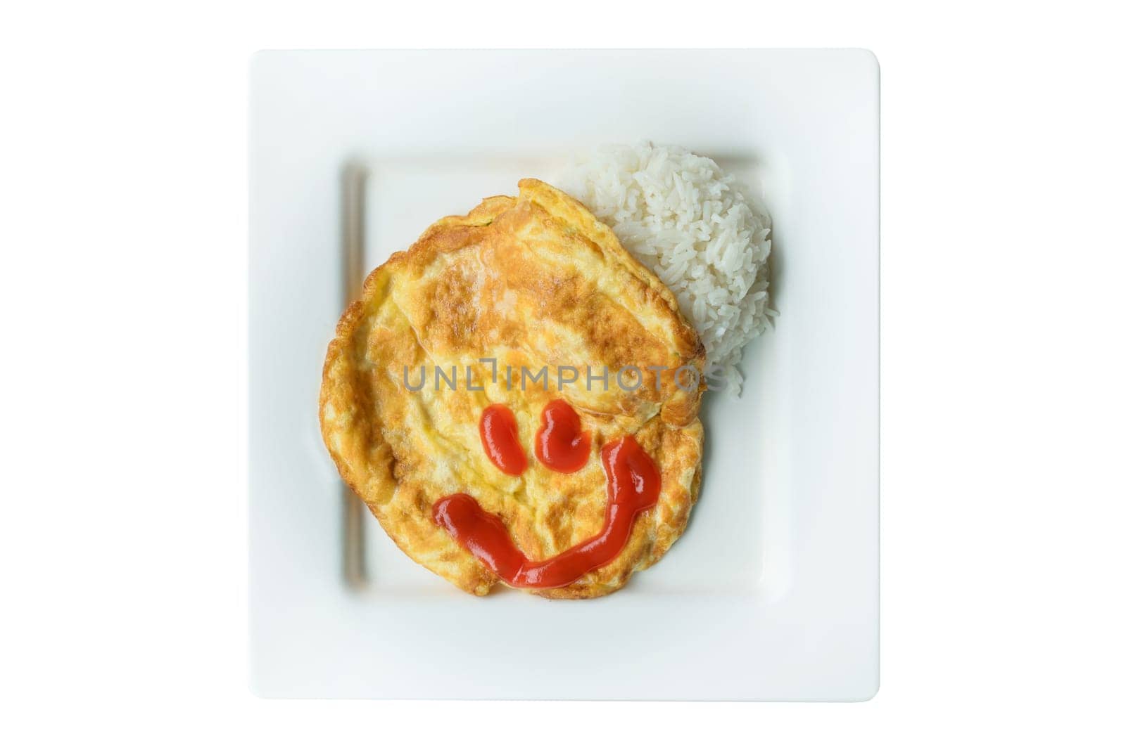 Omelet rice in white dish with smiling chilli sauce. isolated on white background.