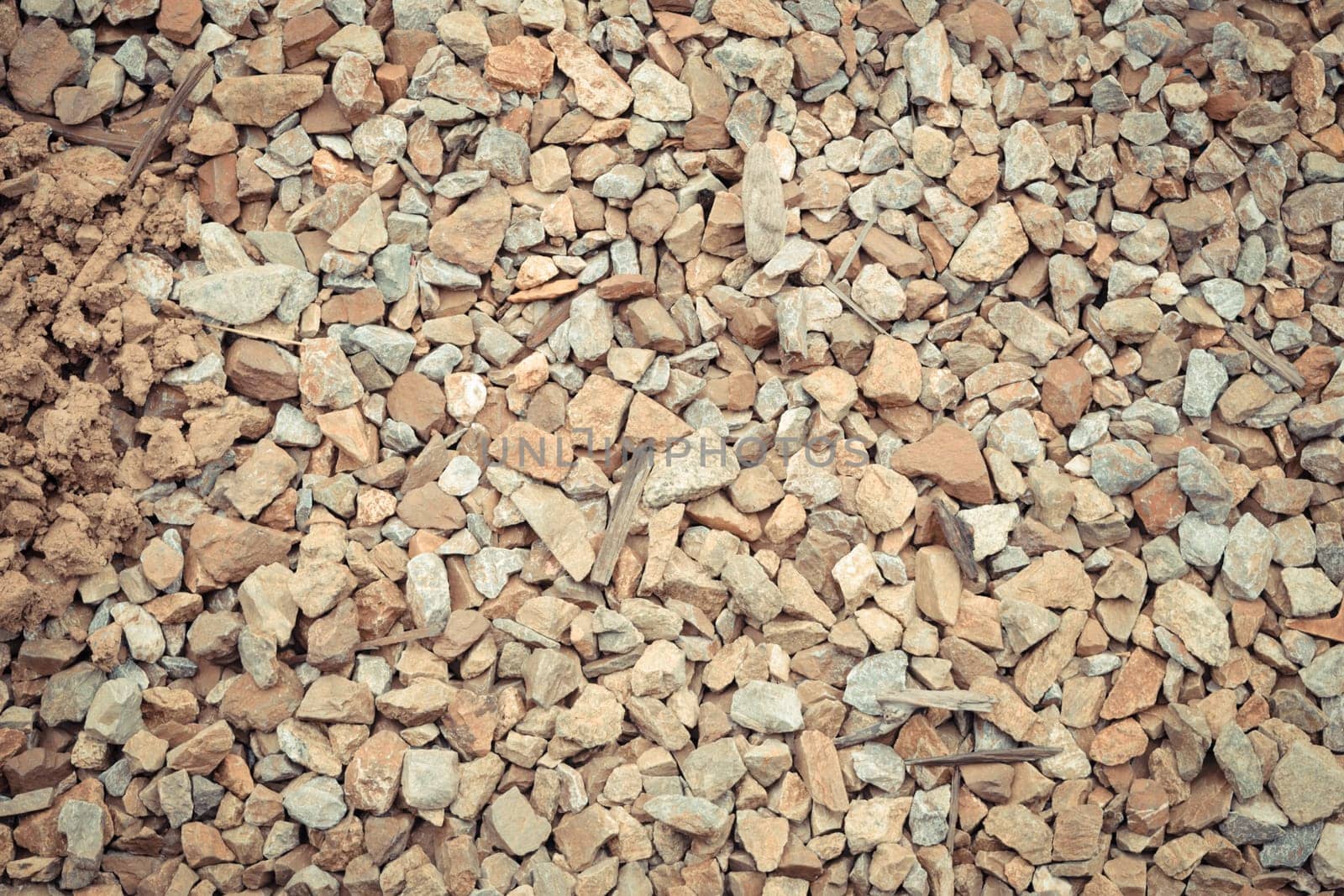 Stone wall texture background surface natural color , process in vintage style