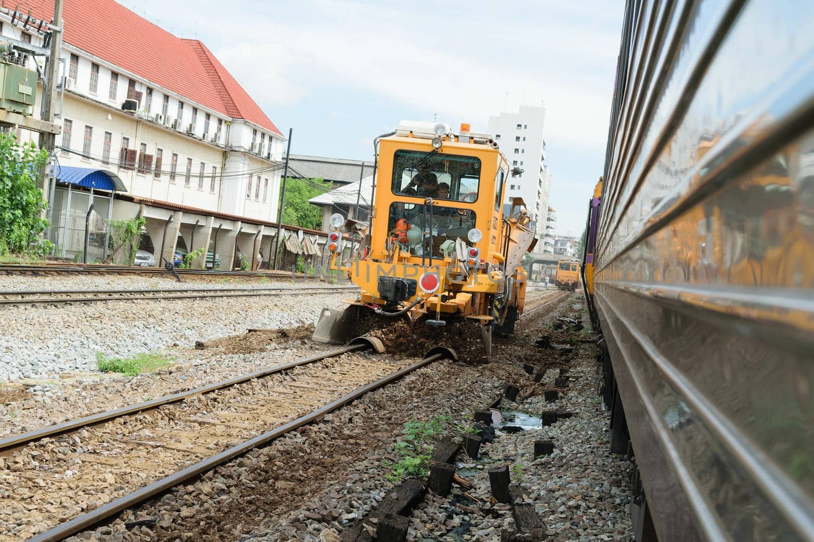 Bangkok, Thailand - September 5, 2015 : Restoration the railroad tracks by Plasser and Theurer machine at State Railway of Thailand.