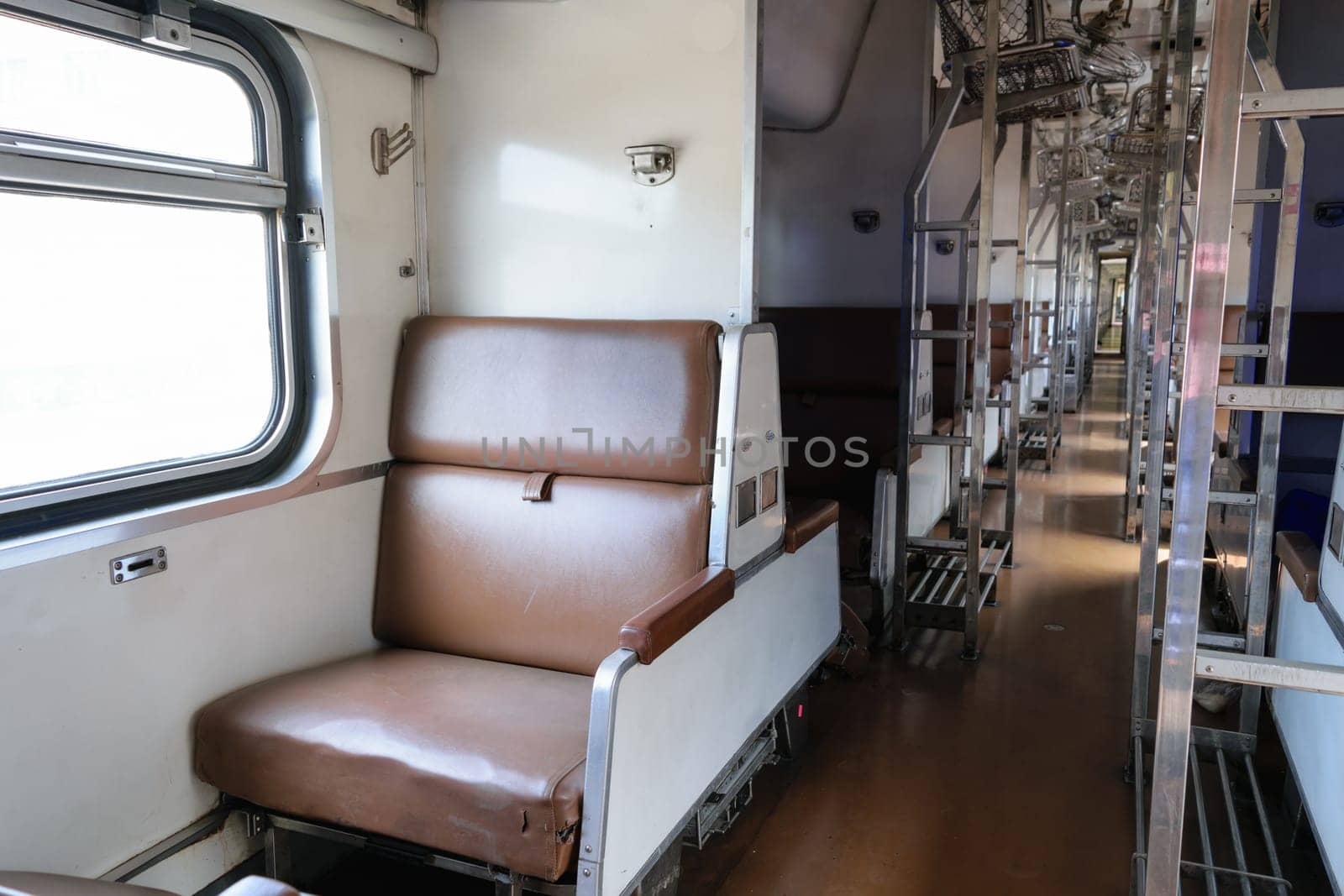 Cabin of a Public Thai Train Railway with seat. This is a public train Does not require a property release.