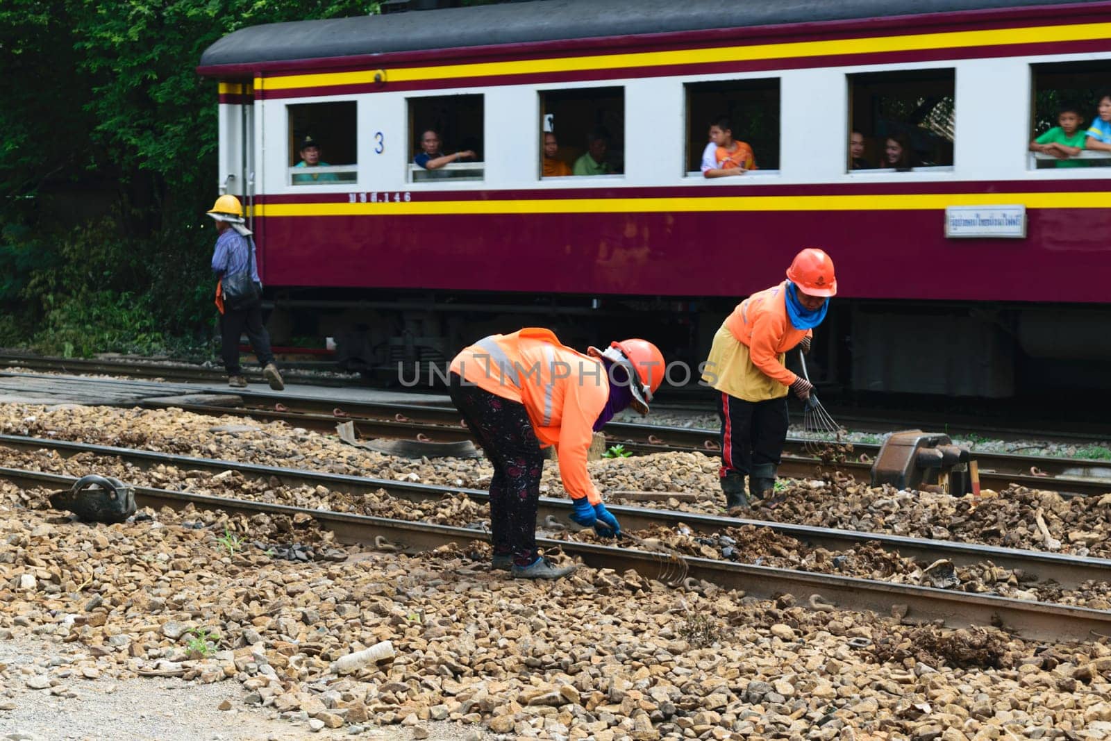 Bangkok, Thailand - September 5, 2015 : Unidentified railway employees working for restoration the railroad tracks before serving at State Railway of Thailand.