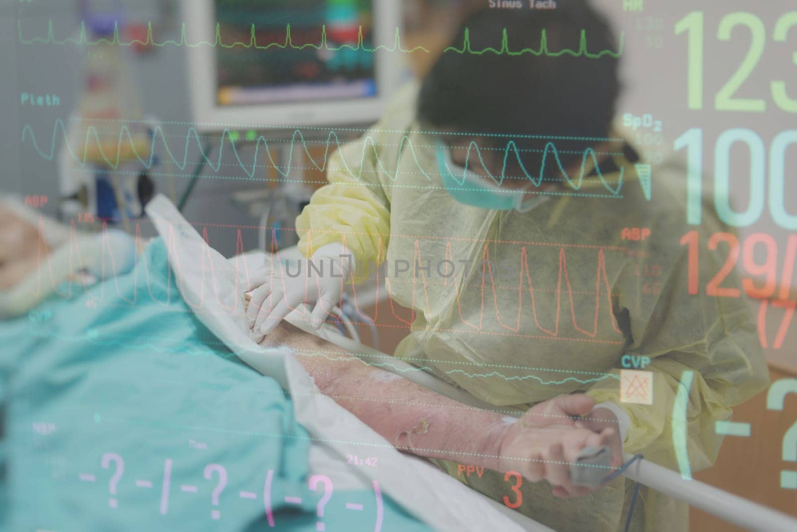 Asian women 40s years old in isolation gown non-sterile coat is a patient relative taking care of the CRE. or VRE. infected elder patient 80s years old on bed in the hospital with graph for heart rate