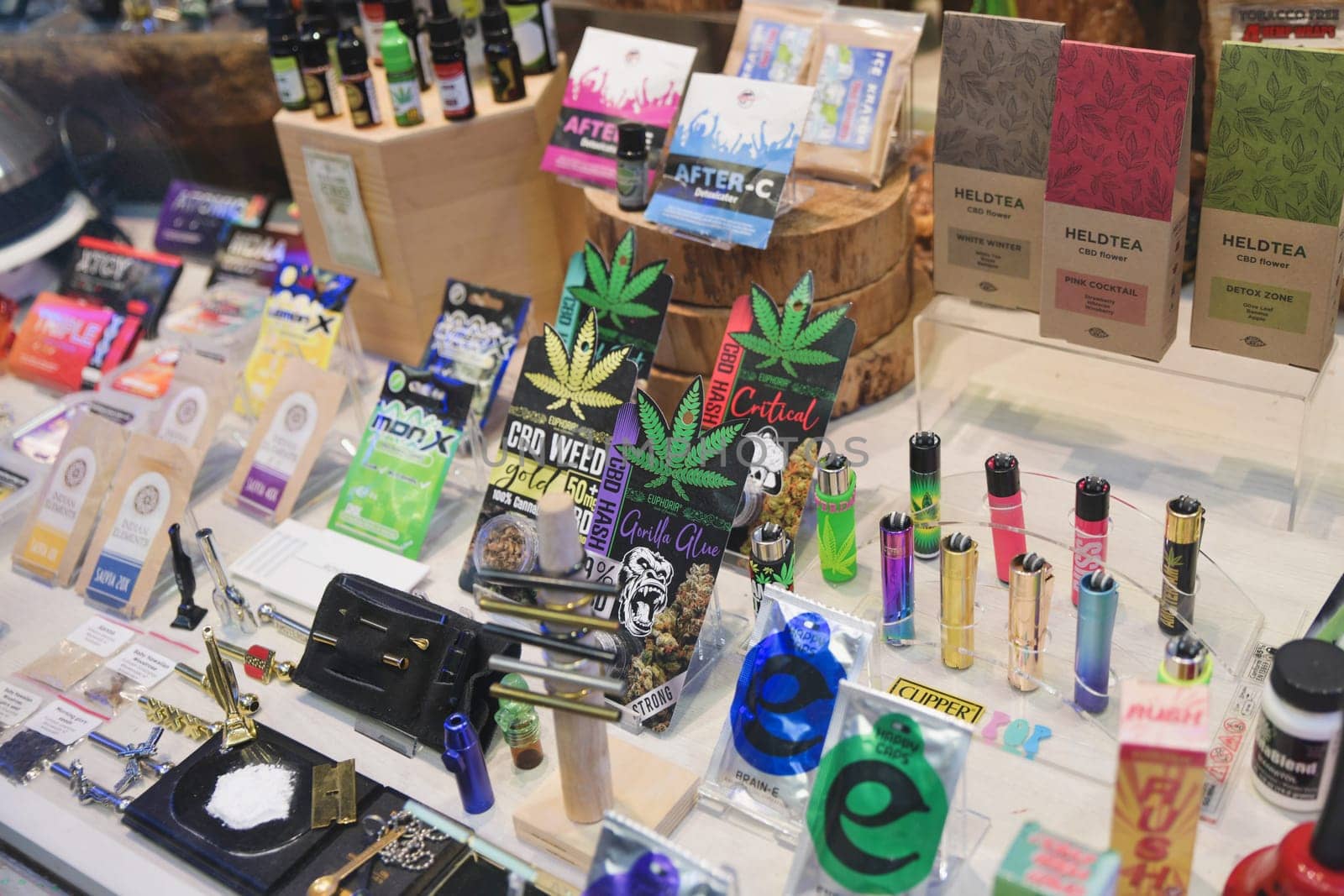 AMSTERDAM, THE NETHERLANDS - APRIL 15, 2019: Shop window with cookies, candies, oil,tea of cannabis as a souvenir in the showcase of store