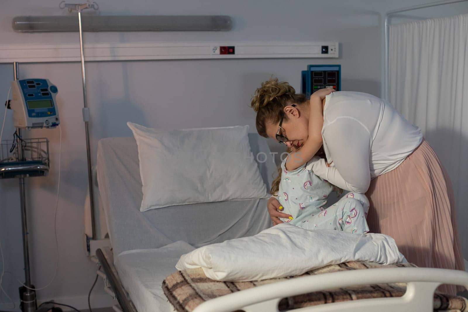 A very touching and heartfelt moment of emotional support in a hospital setting shared between loved ones