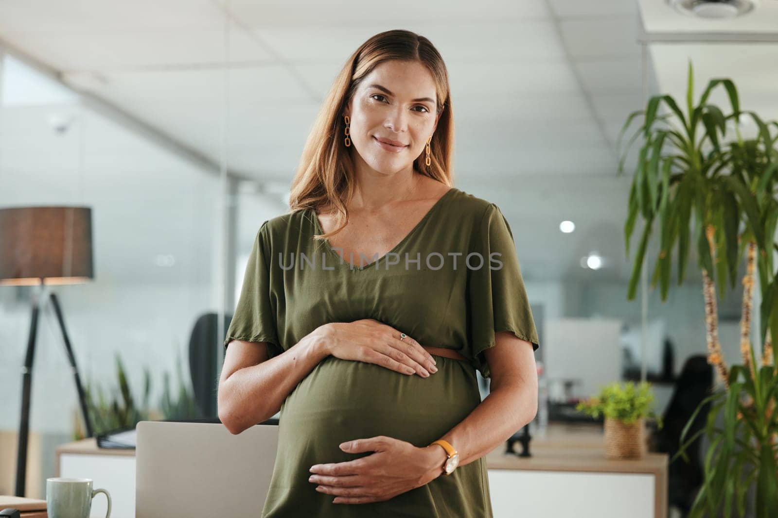 Portrait, stomach and a pregnant business woman in her office at the start of her maternity leave from work. Company, belly and pregnancy with a happy young employee in the workplace for motherhood.