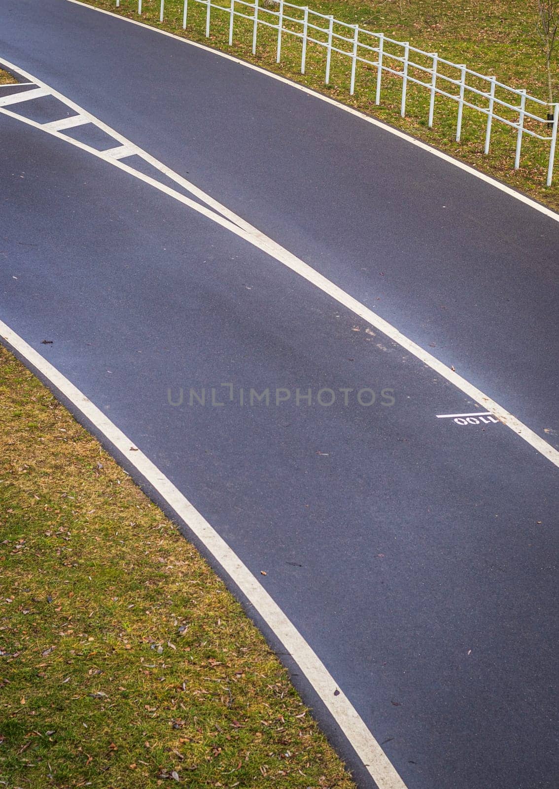 Jogging, walking, cycling path in the park