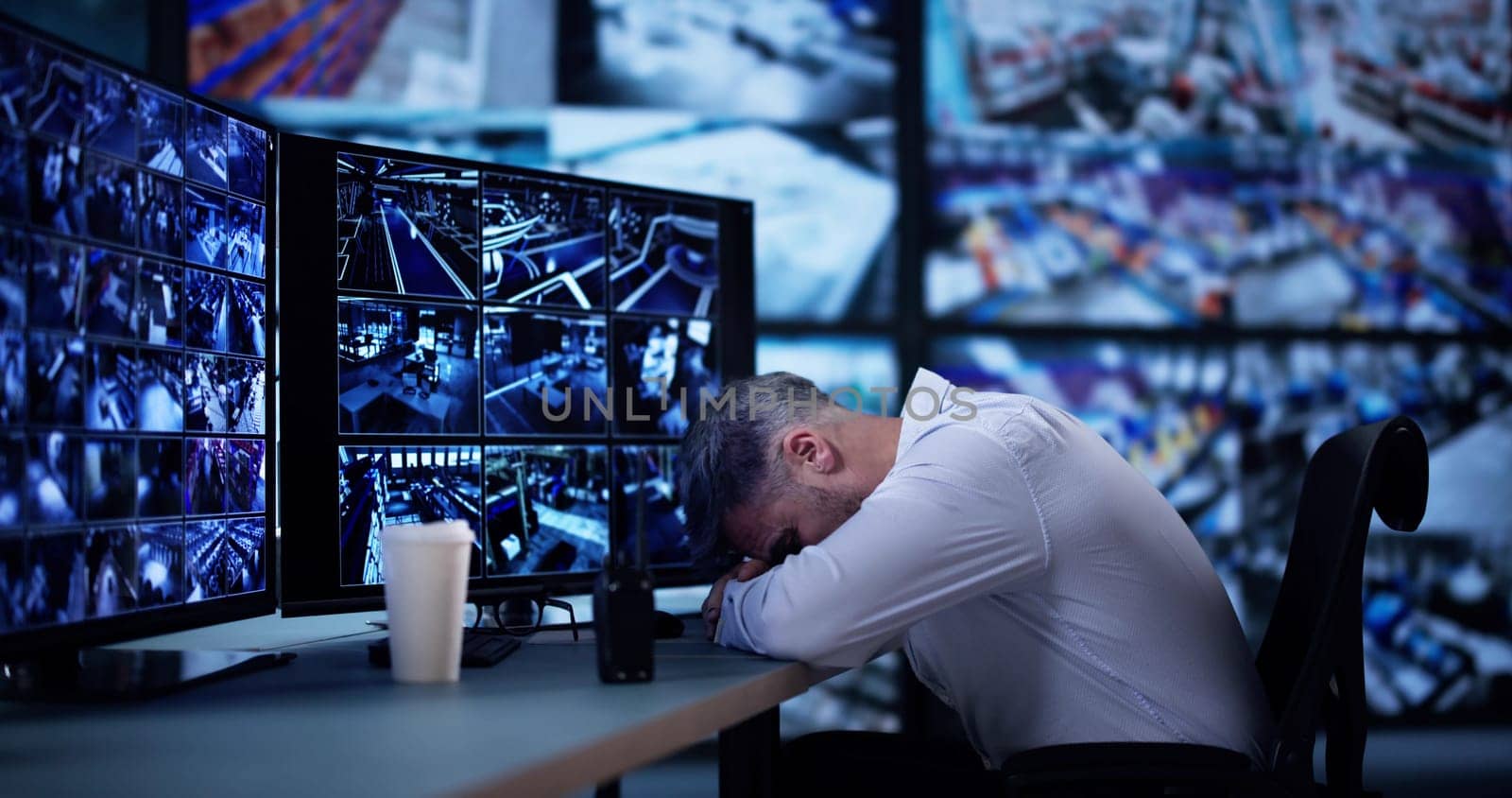 Security System CCTV Camera Operator Using Computer Monitor