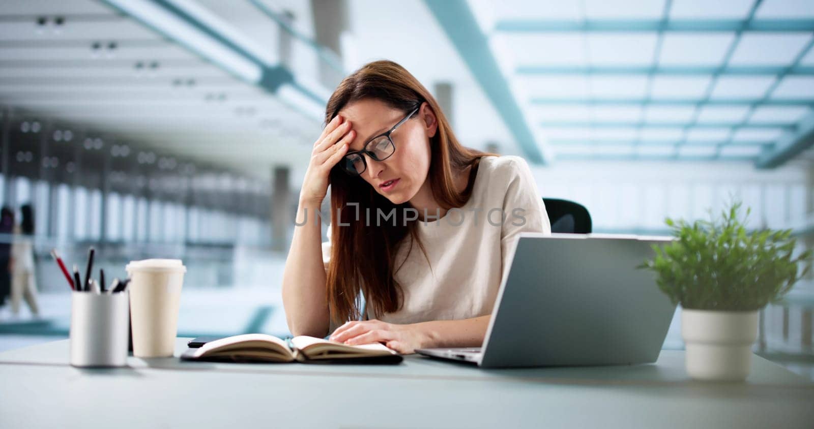 Young female journalist researches music for virtual online webinar review.
