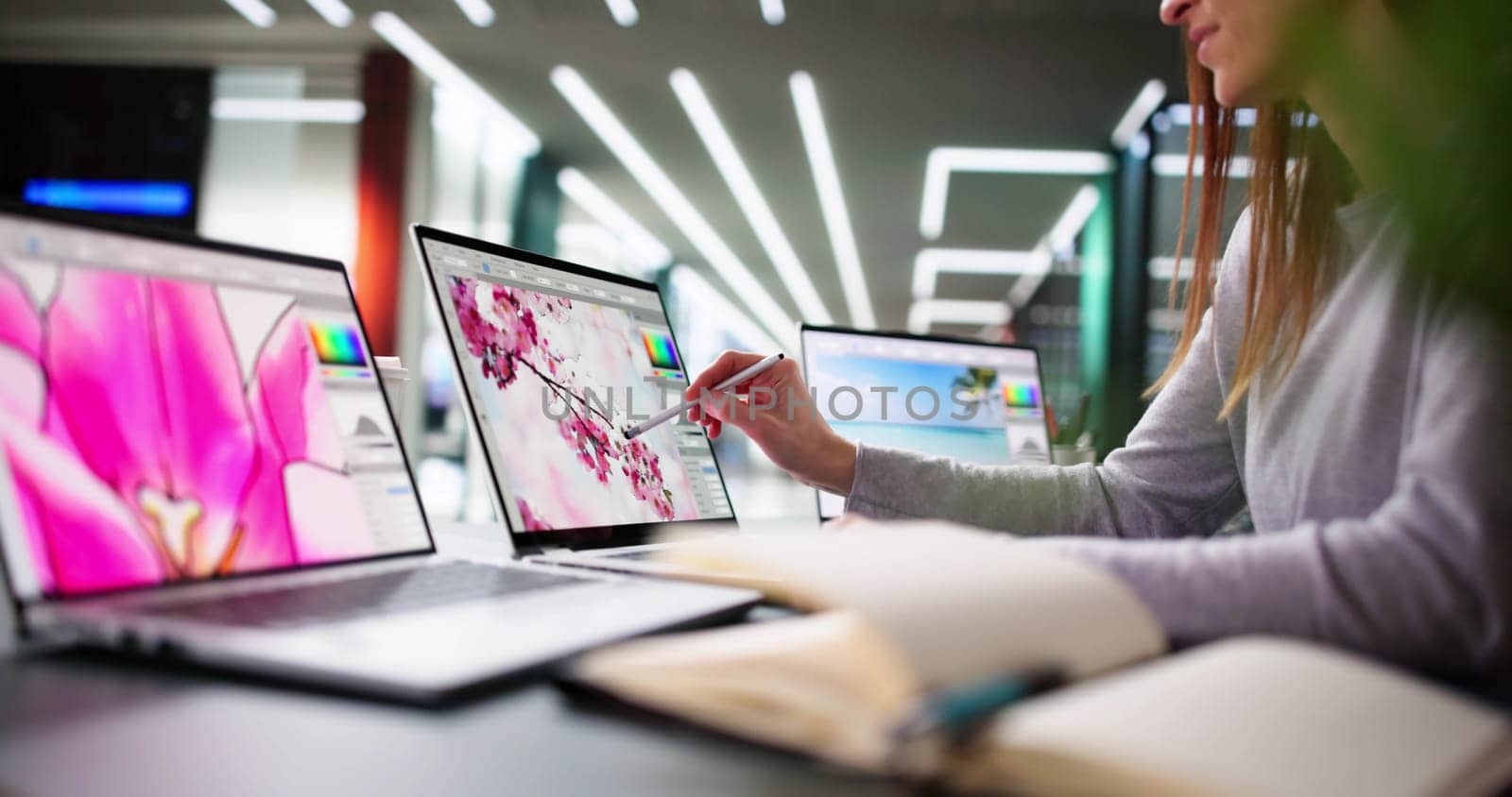 Busy Graphic Designer Creating Websites and Logos in Office Studio.