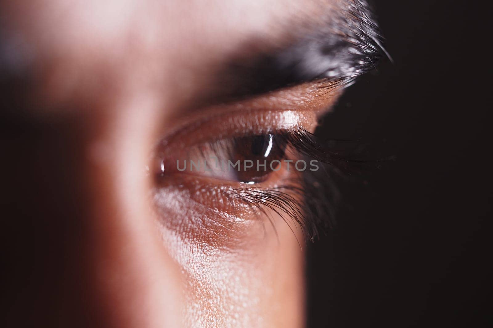 Detailed look at a person's eye showcasing depth and emotion