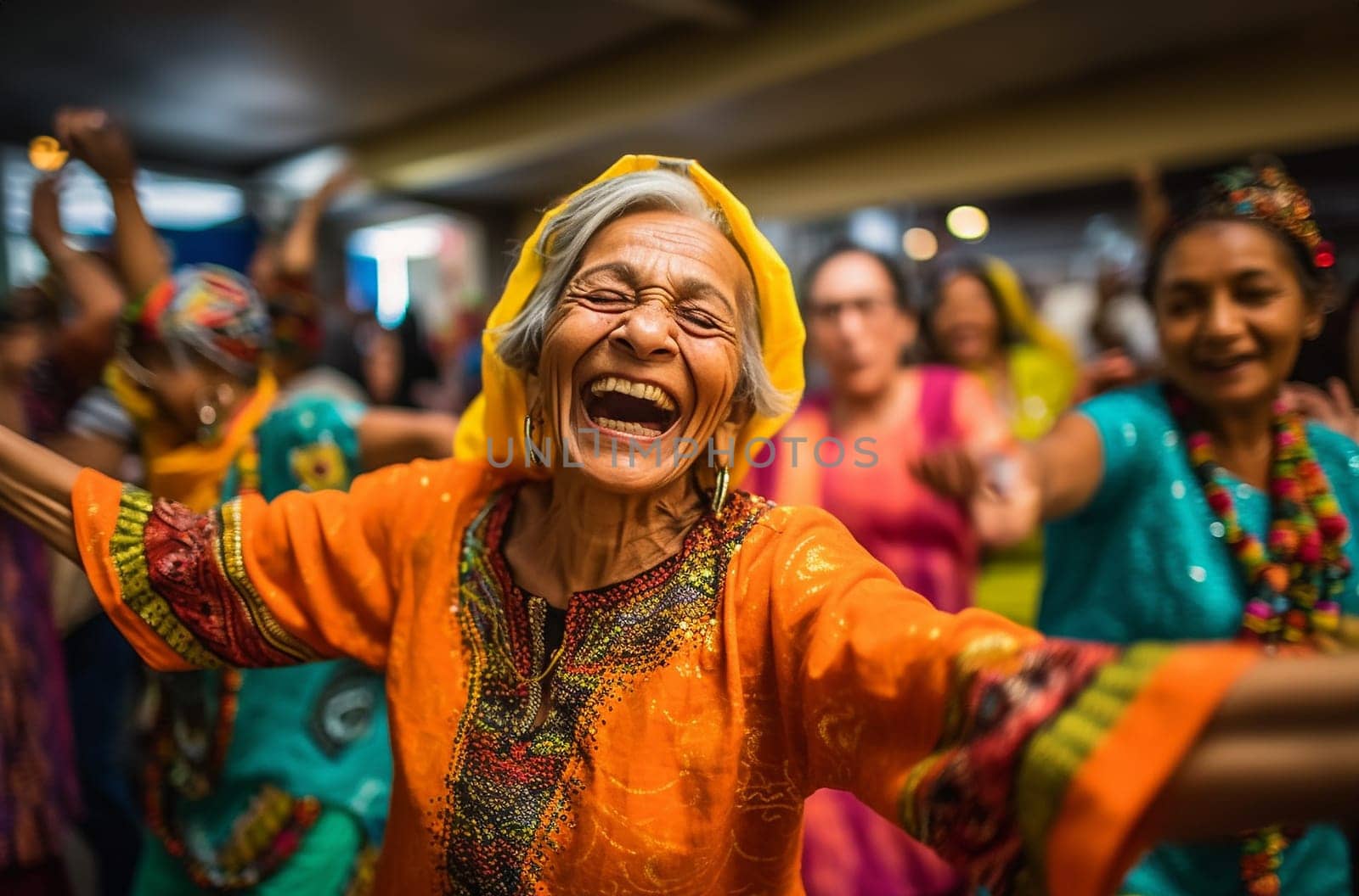 Big Family Celebrating Diwali Indian Family elderly in Traditional Clothes Gathered Together dancing having fun. Indian Moment of Happiness on a Hindu Holiday Party