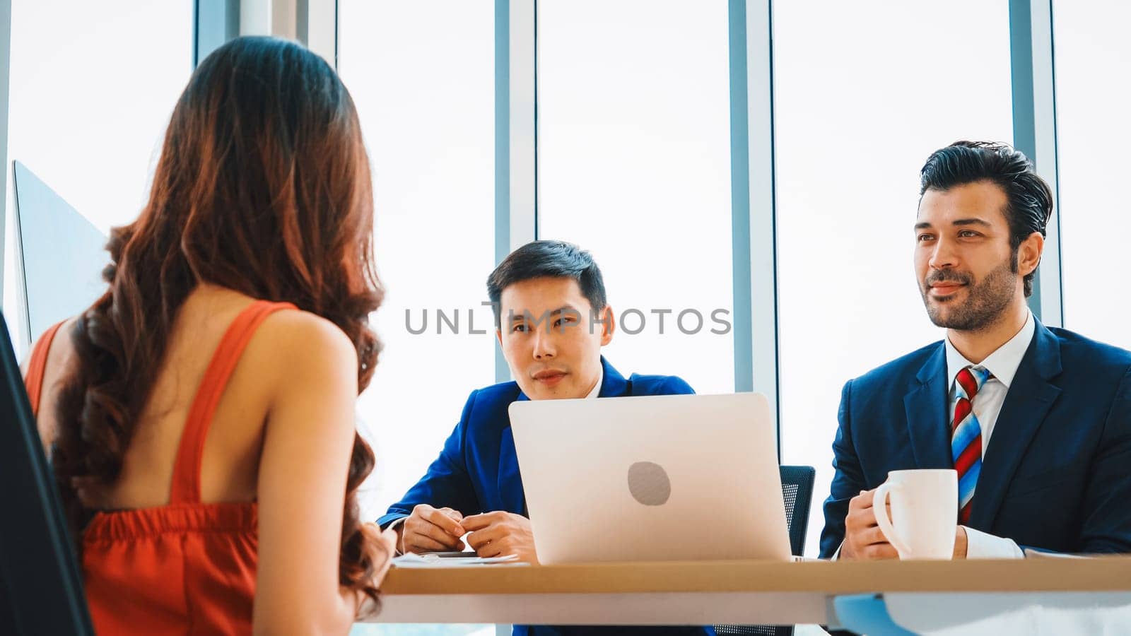 Job seeker in job interview meeting with manager and interviewer at corporate office. The young interviewee seek for professional career job opportunity . Human resources and recruitment concept. Jivy