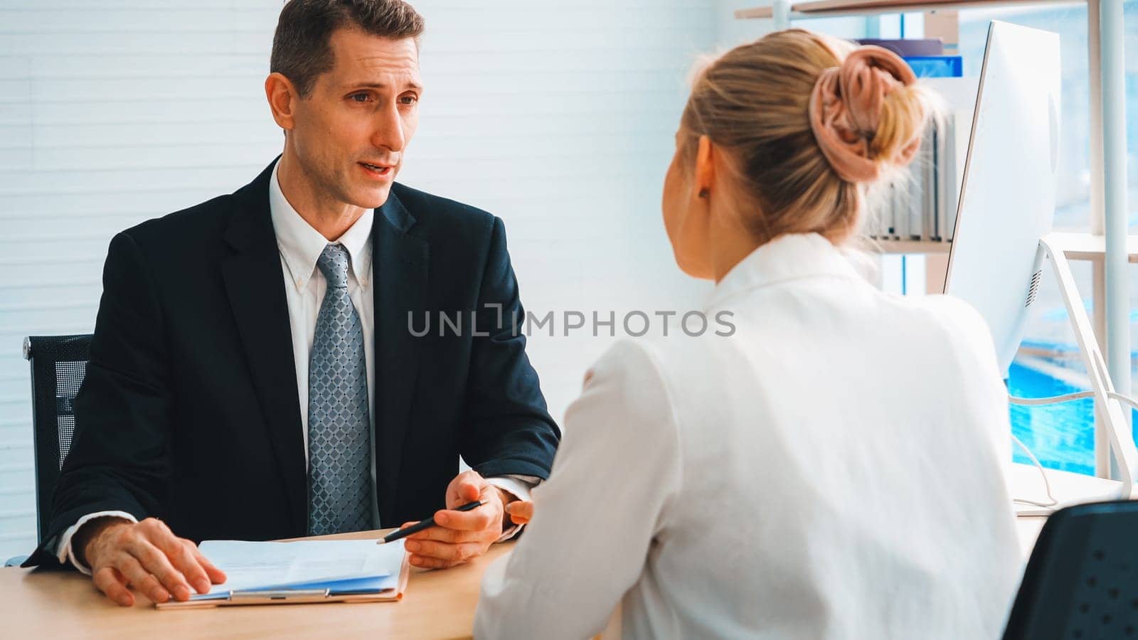 Job seeker in job interview meeting with manager and interviewer at corporate office. The young interviewee seek for professional career job opportunity . Human resources and recruitment concept. Jivy