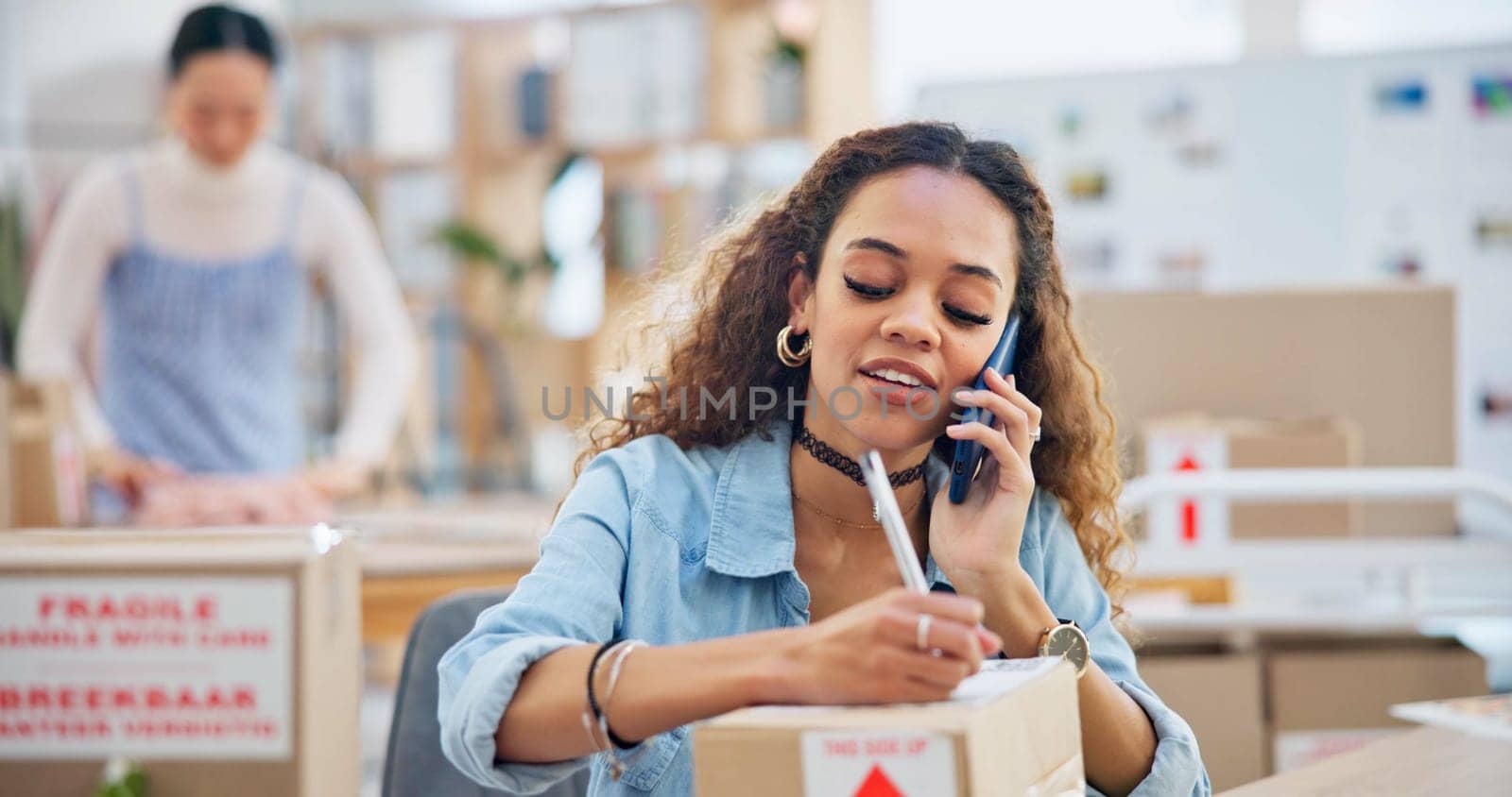 Business, phone call and woman writing, delivery and order with distribution, inventory and connection. Person, employee and professional with a smartphone, communication and shipment with network by YuriArcurs