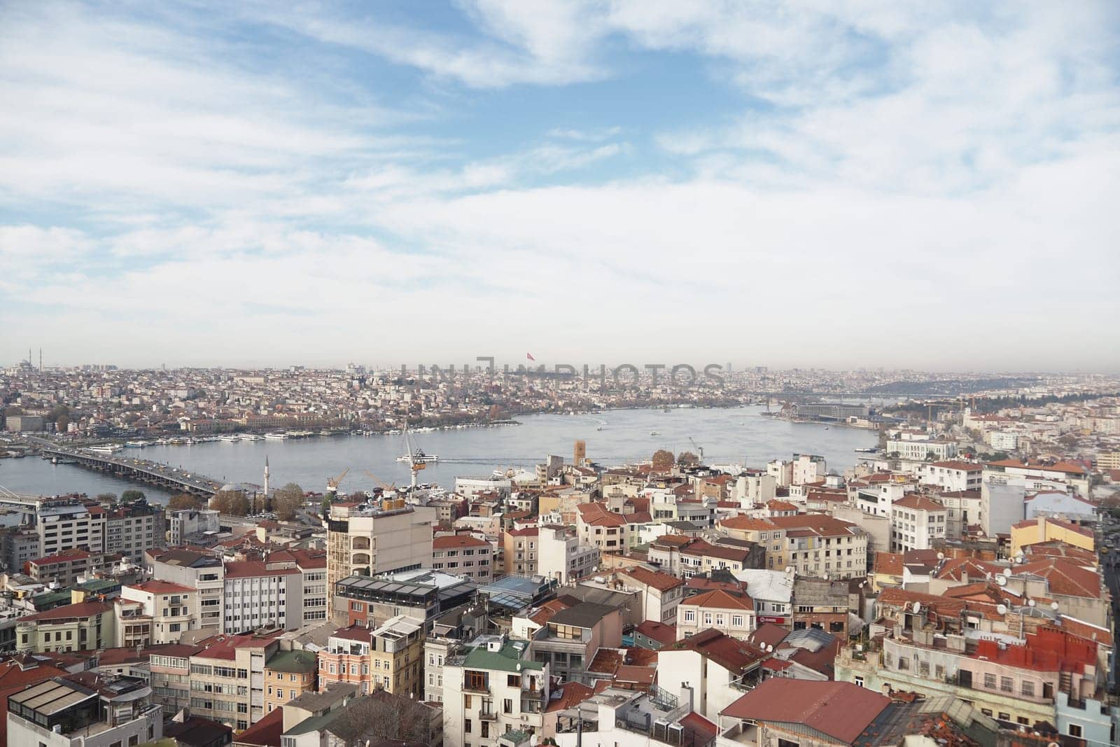Sweeping view of Istanbul's cityscape, showcasing buildings and waterway.