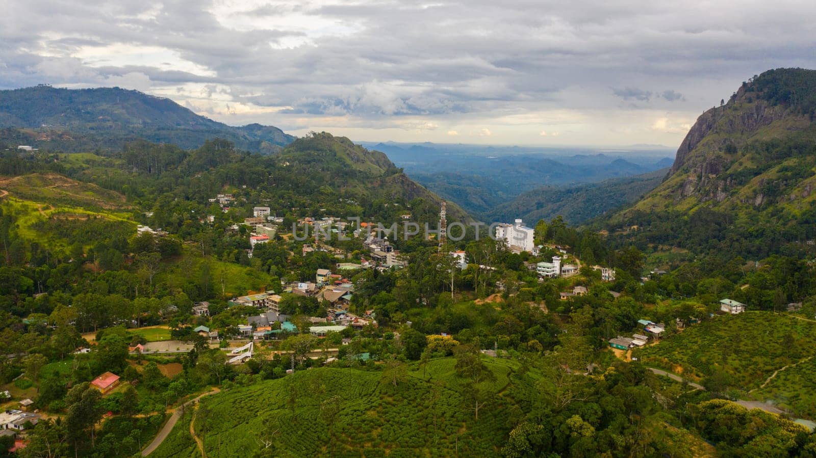 The town of Ella is surrounded by green hills with tea plantations and agricultural lands. Sri Lanka.