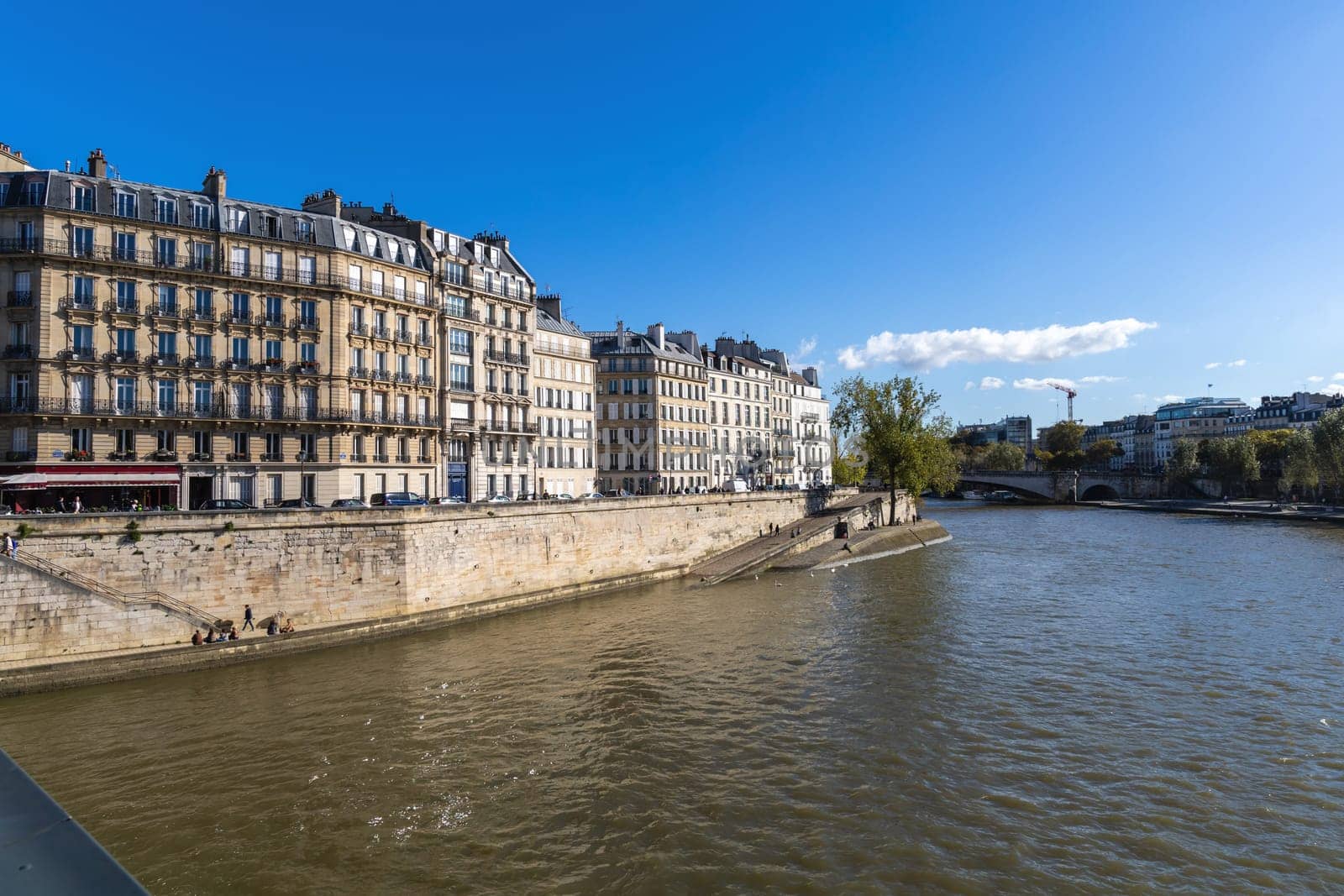 Beautiful view of Paris with buildings and river. Paris, France - February 10, 2025