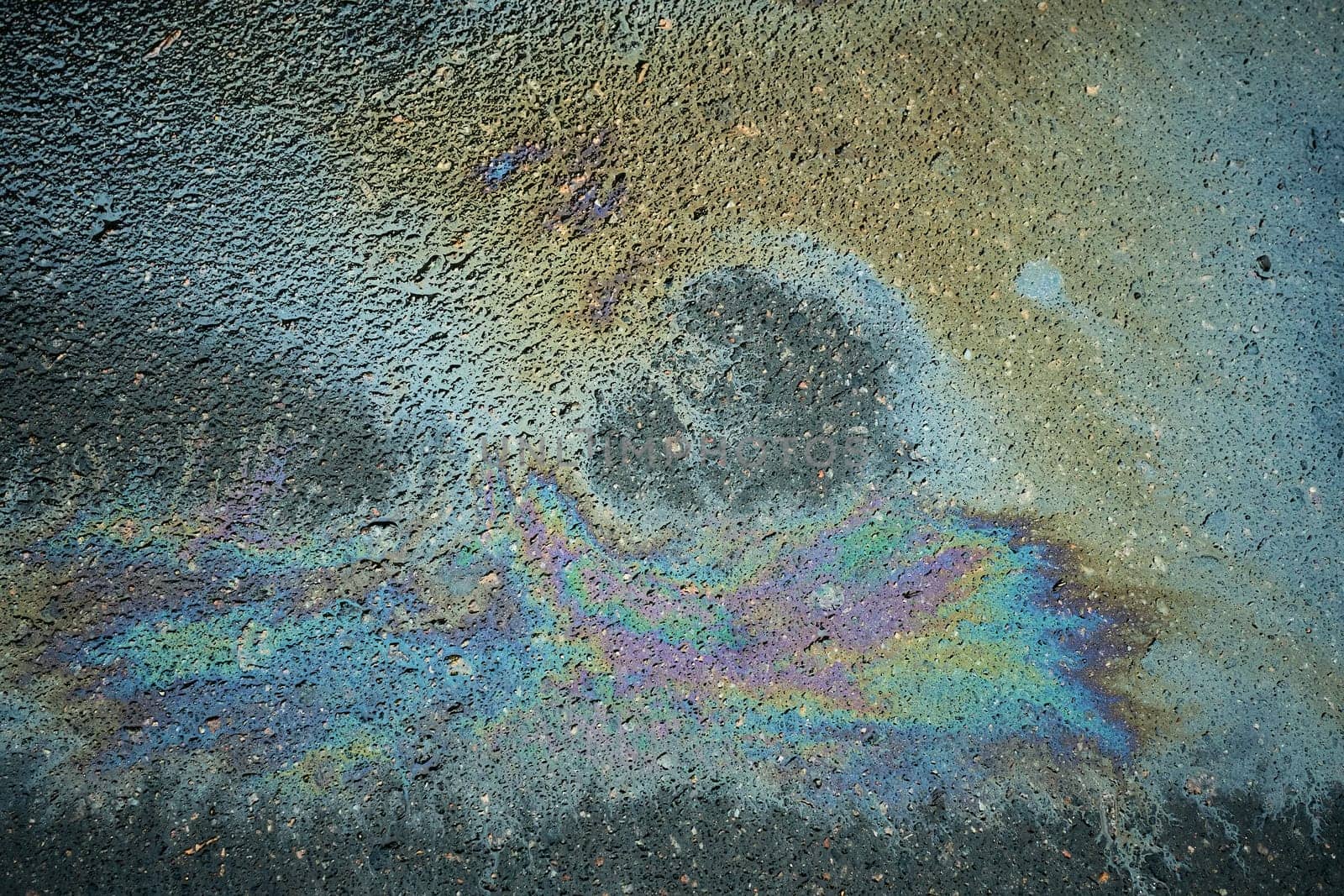 Colorful oil stain creating an eye-catching abstract composition that fascinates the viewer