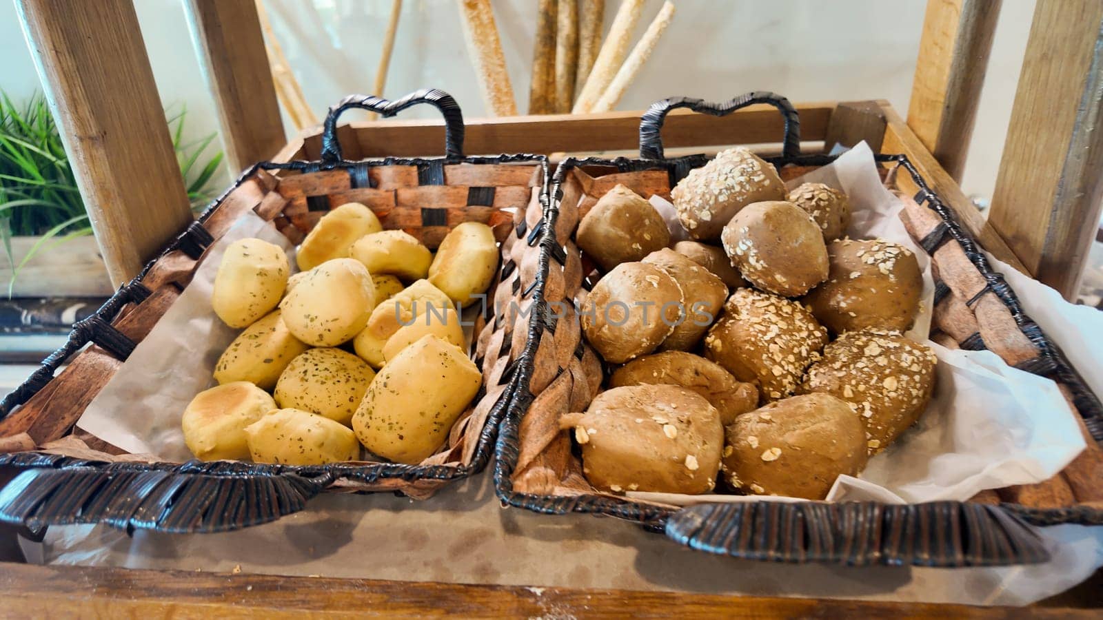 Artisan bread rolls served in woven baskets at a local cafe