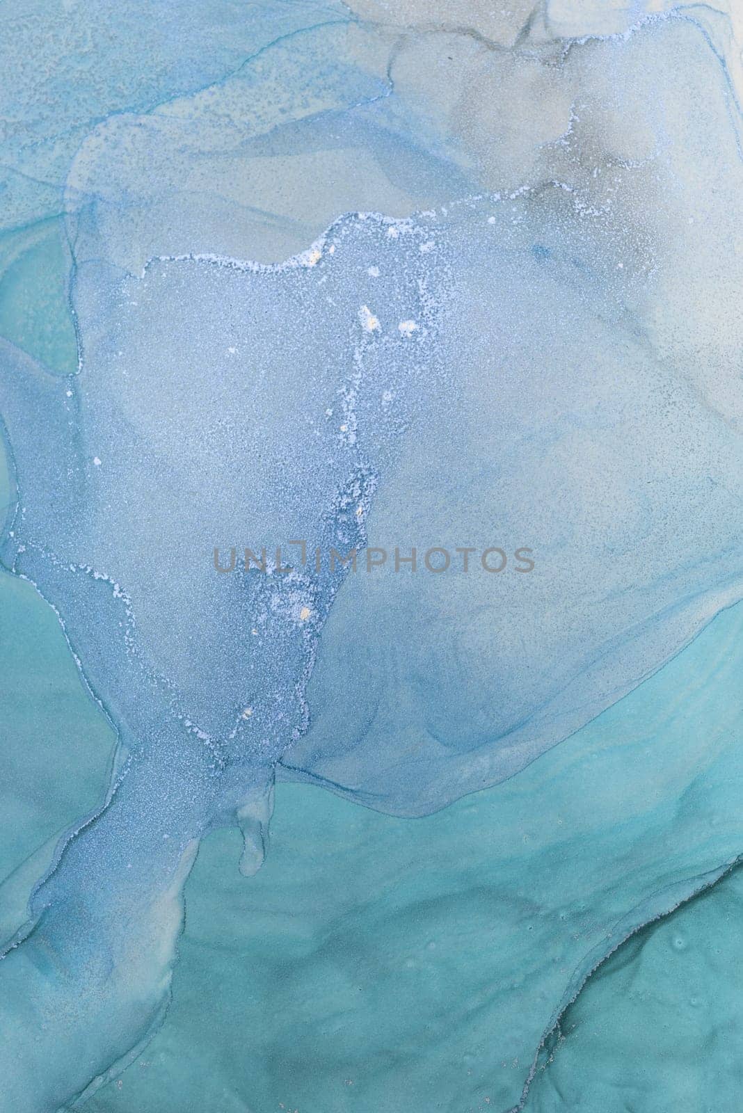 This artwork showcases a captivating alcohol ink abstract composition featuring flowing blue hues and soft textures. The delicate interplay of colors creates a tranquil atmosphere.