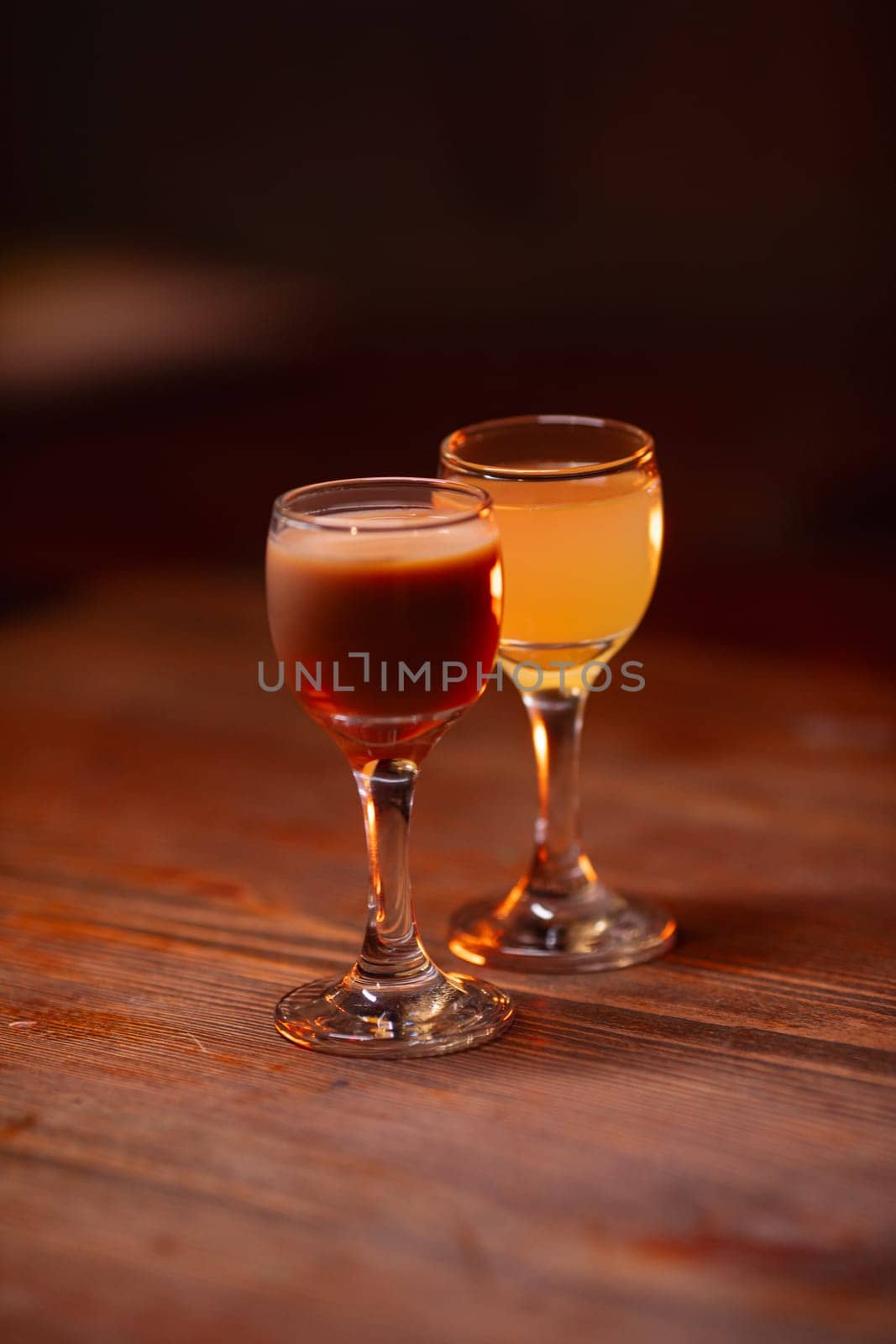 Beautiful photo of cocktail food. A bright juicy cocktail is on the table in the restaurant. Professional food photography.