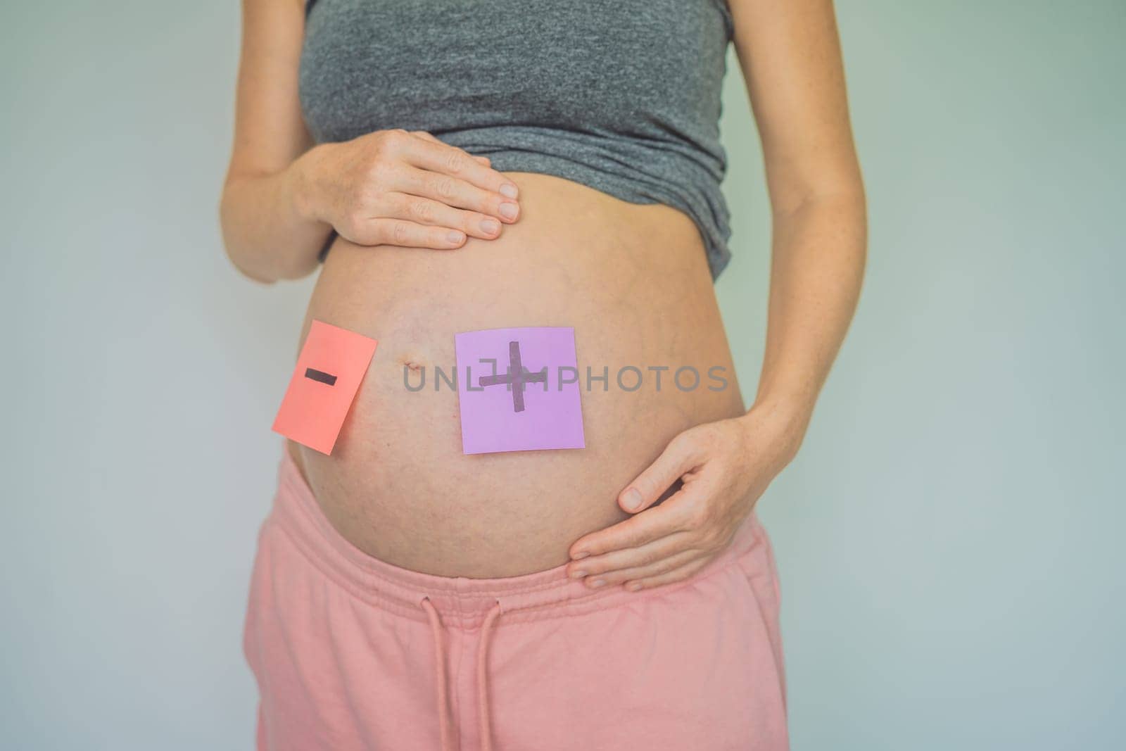 A pregnant mother faces Rhesus conflict with her child, highlighting the complex challenges of maternal and fetal blood type incompatibility.