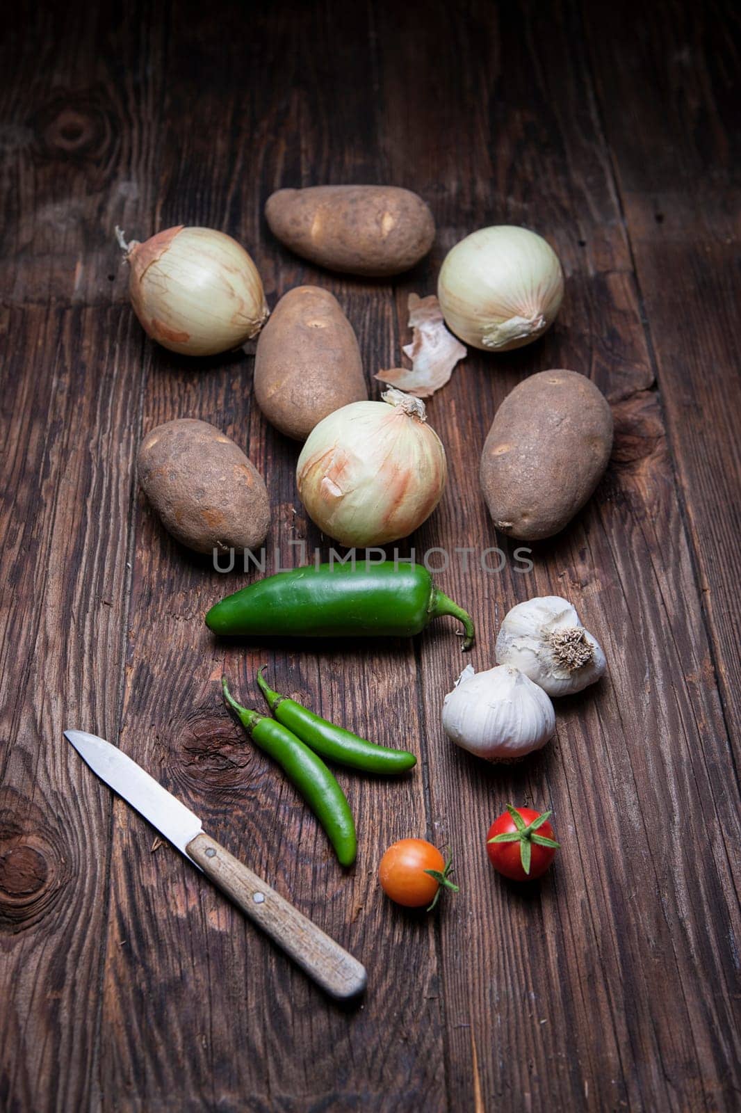 An assortment of vegetables commonly used in cooking.