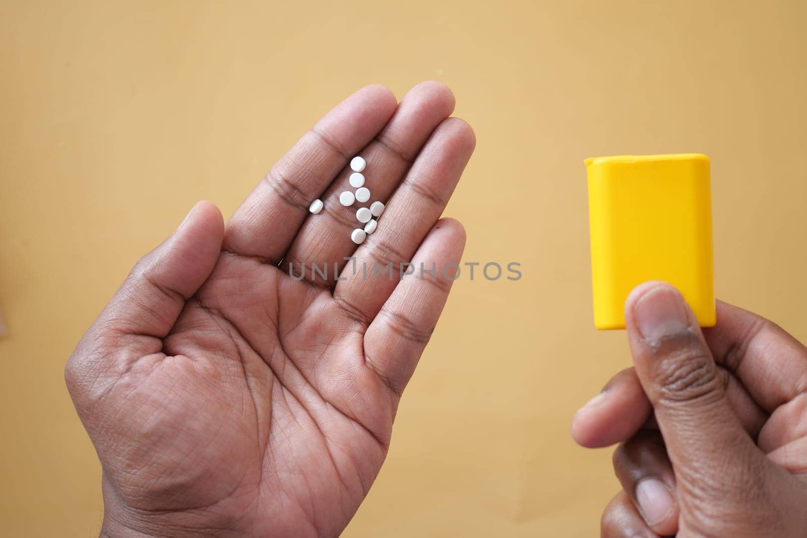 artificial sweetener on hand top view .