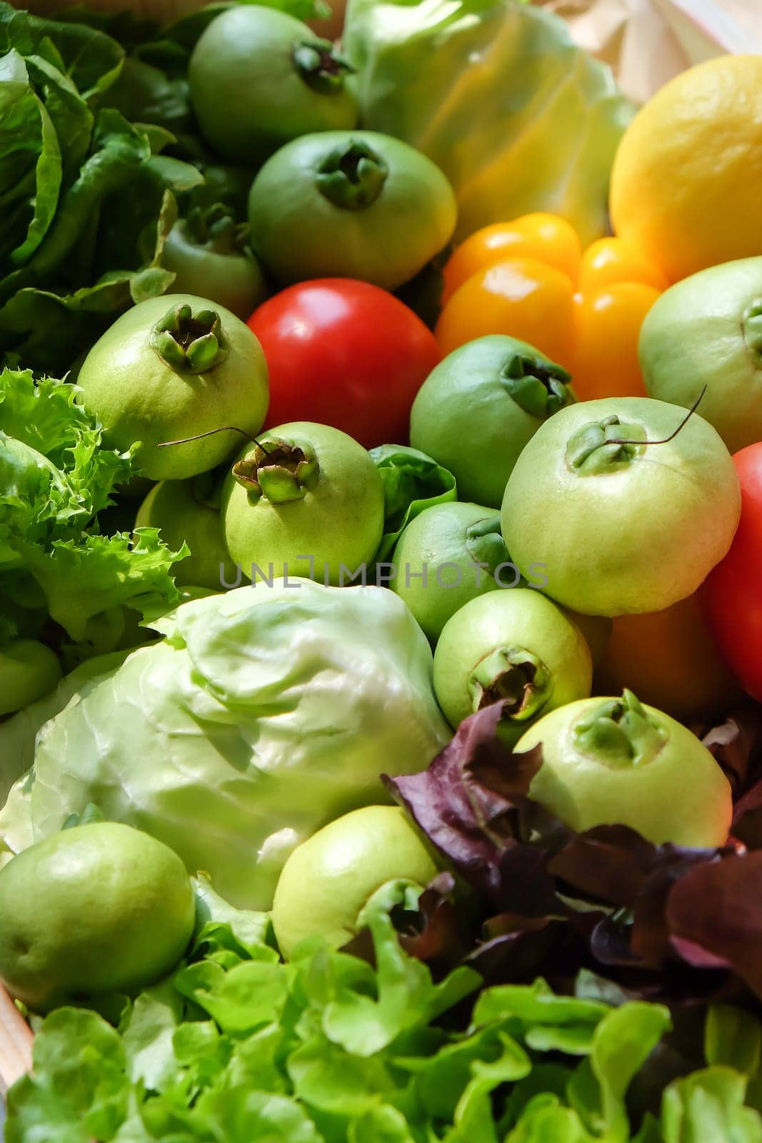 Variety of fresh vegetables in a wooden box. Selective focus.
