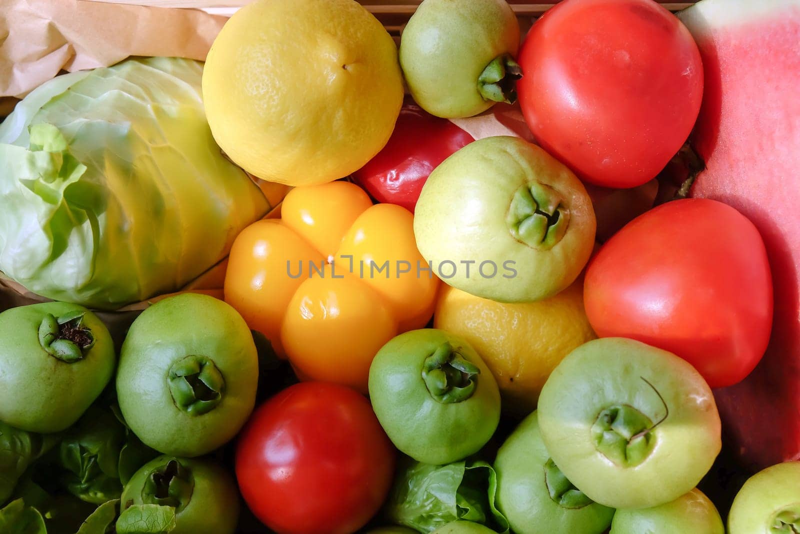 Colorful fresh vegetables and fruits as a background. Top view.