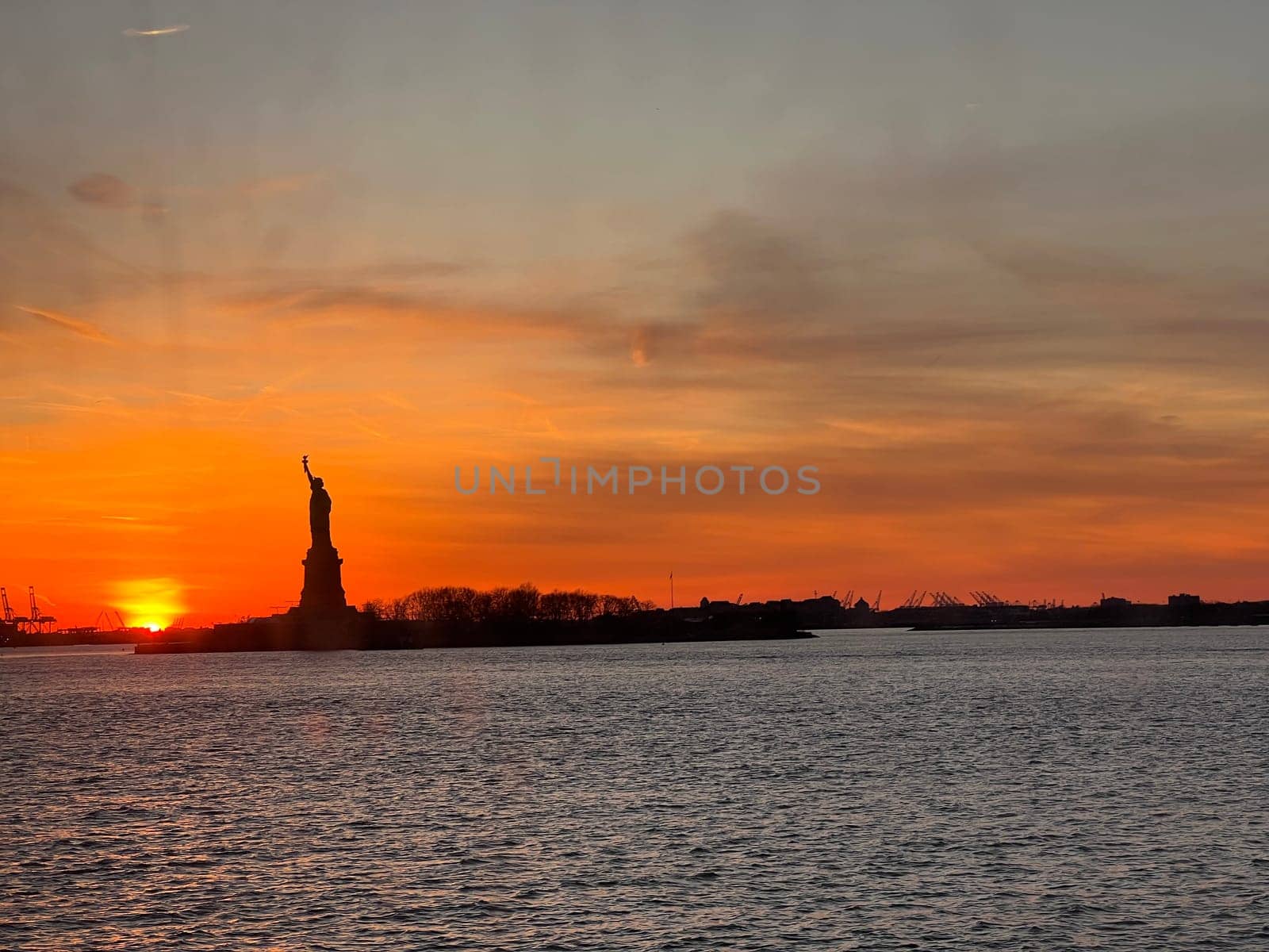 Statue of Liberty at sunset or sunrise in winter. High quality photo