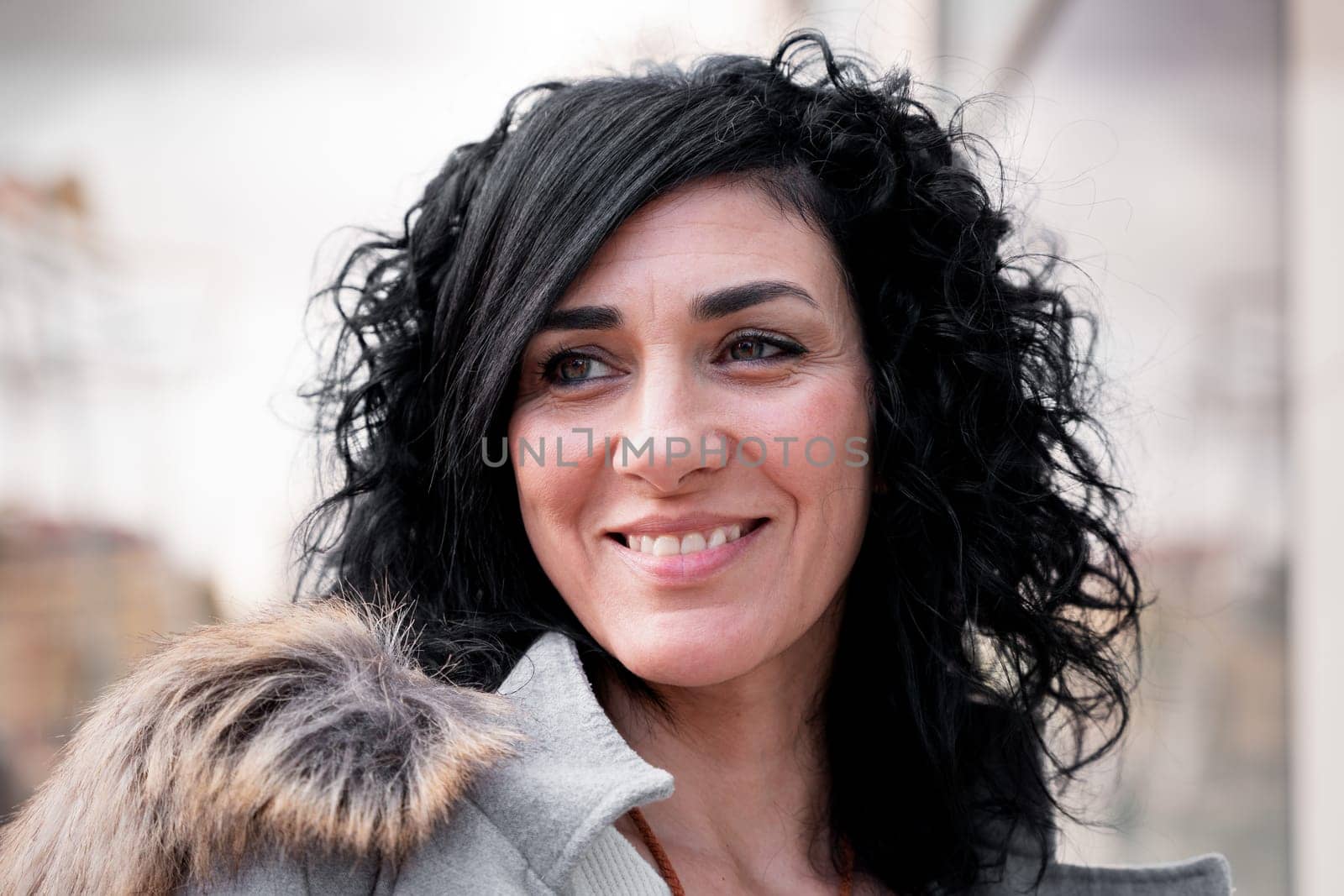 Close-up of a beautiful woman with a perfect smile. White teeth.