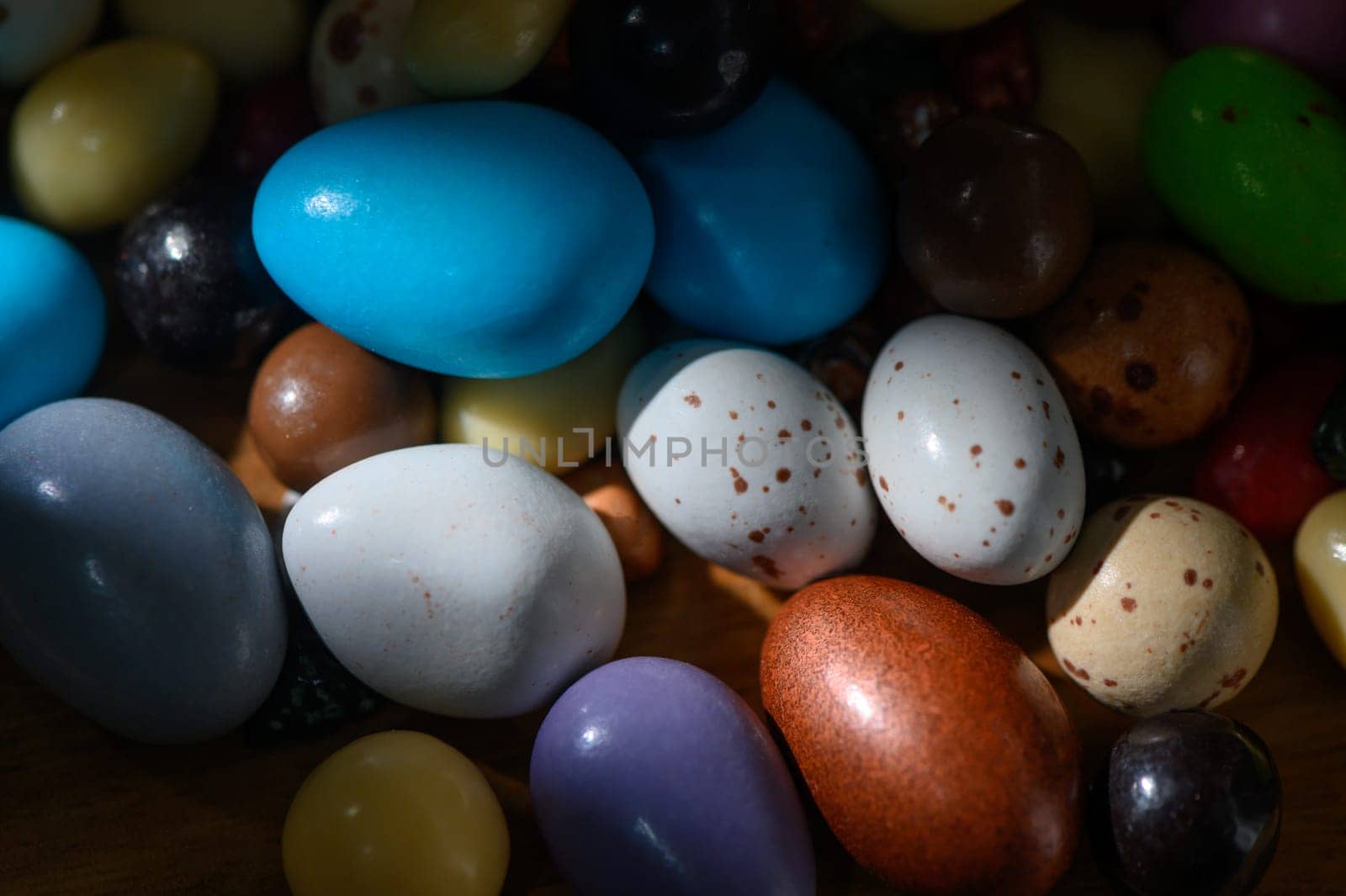 A vibrant collection of eggs in various colors and patterns captures the essence of spring festivities and joy.