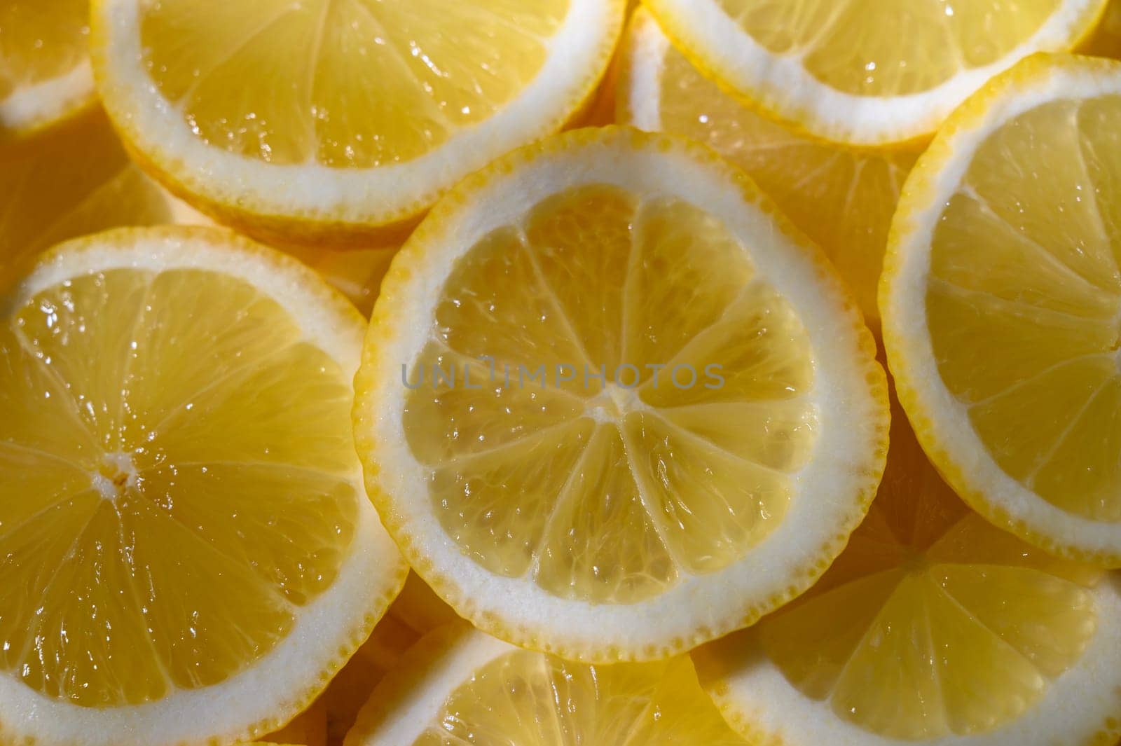 Lemon wedges create a lively backdrop, inviting culinary creativity and refreshing flavor exploration in the kitchen.