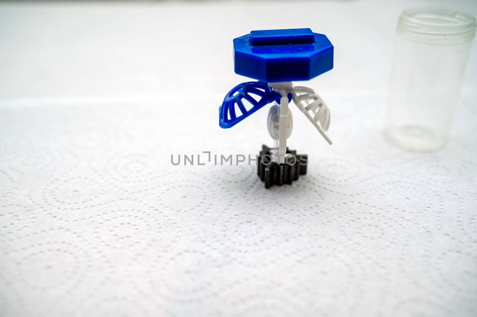 container for cleaning and storing contact lenses for eyes, used at home. For soft and hard lenses. the container consists of two parts, the first one for lenses, open, the second part for liquid