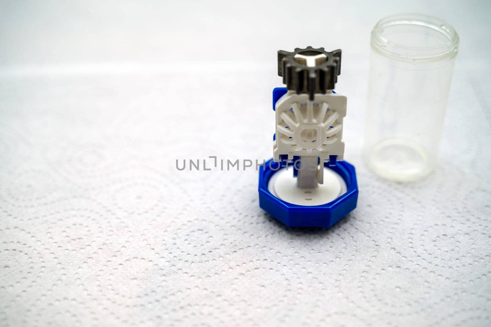 container for cleaning and storing contact lenses for eyes, used at home. For soft and hard lenses. the container consists of two parts, the first part directly for lenses, the second part for liquid