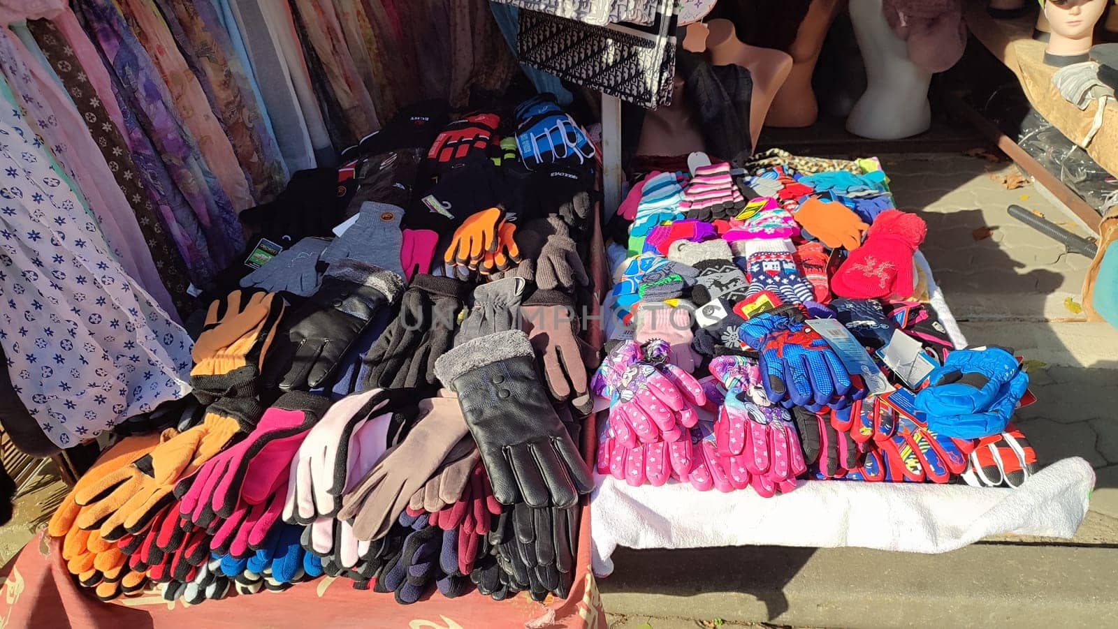Gloves colorful display clothing shop street store objects fashion show . High quality photo