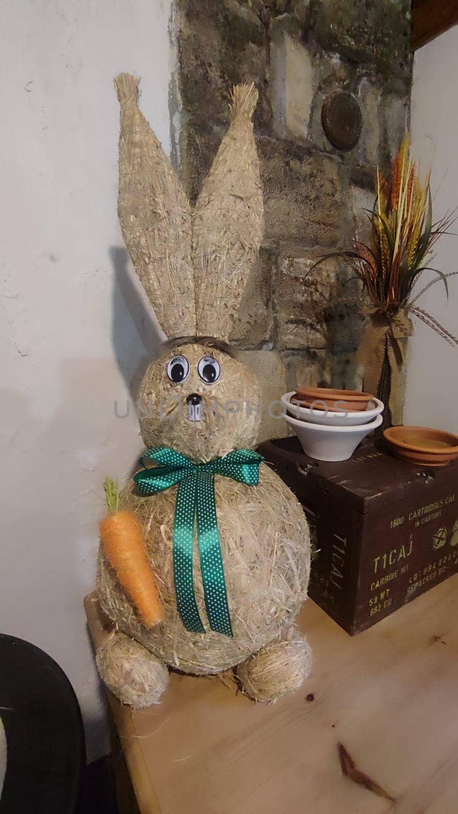 Straw rabbit decoration bunny old toy objects. High quality photo