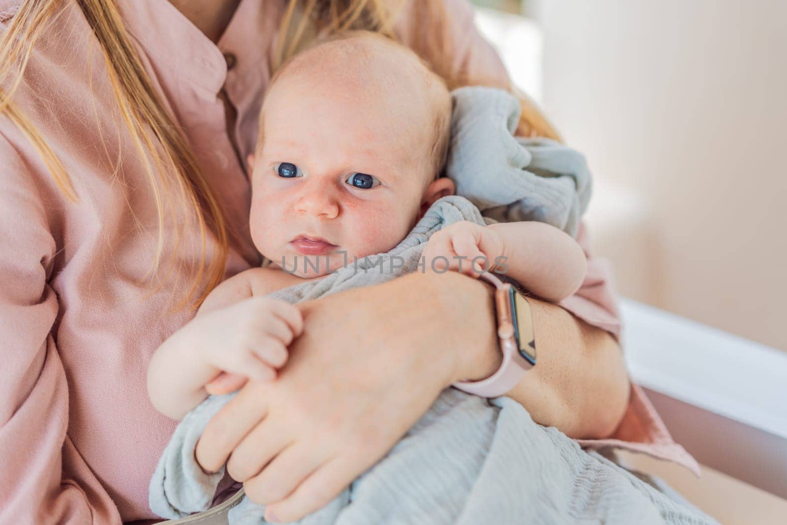 A mother lovingly embraces her newborn baby, holding them close to her chest. A tender moment of warmth, security, and deep maternal love, symbolizing bonding, comfort, and the unbreakable connection between mother and child.