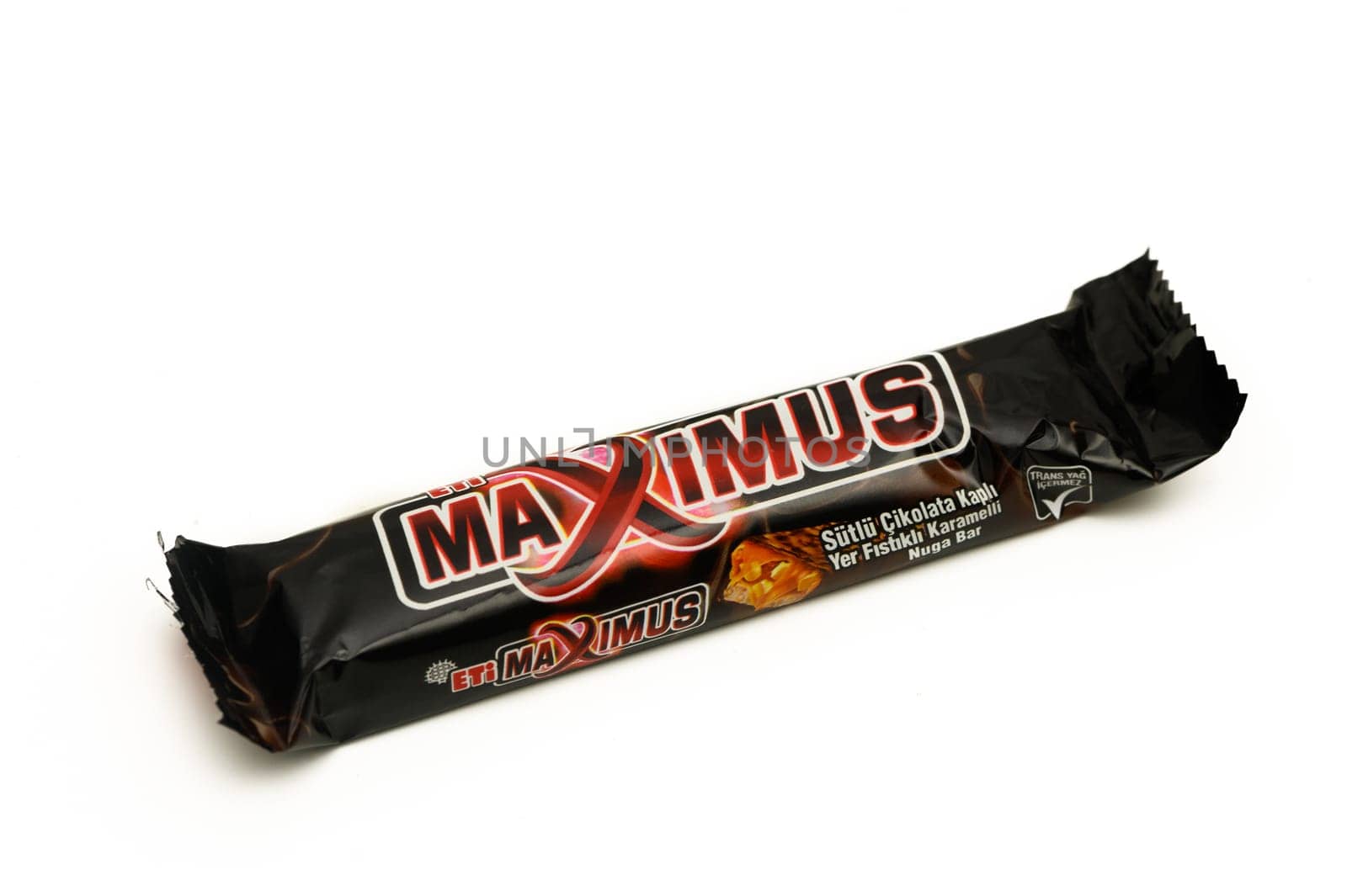 Gaziveren Cyprus -10.02.2025 A tempting chocolate bar wrapped in striking black packaging, featuring enticing branding and playful design elements.