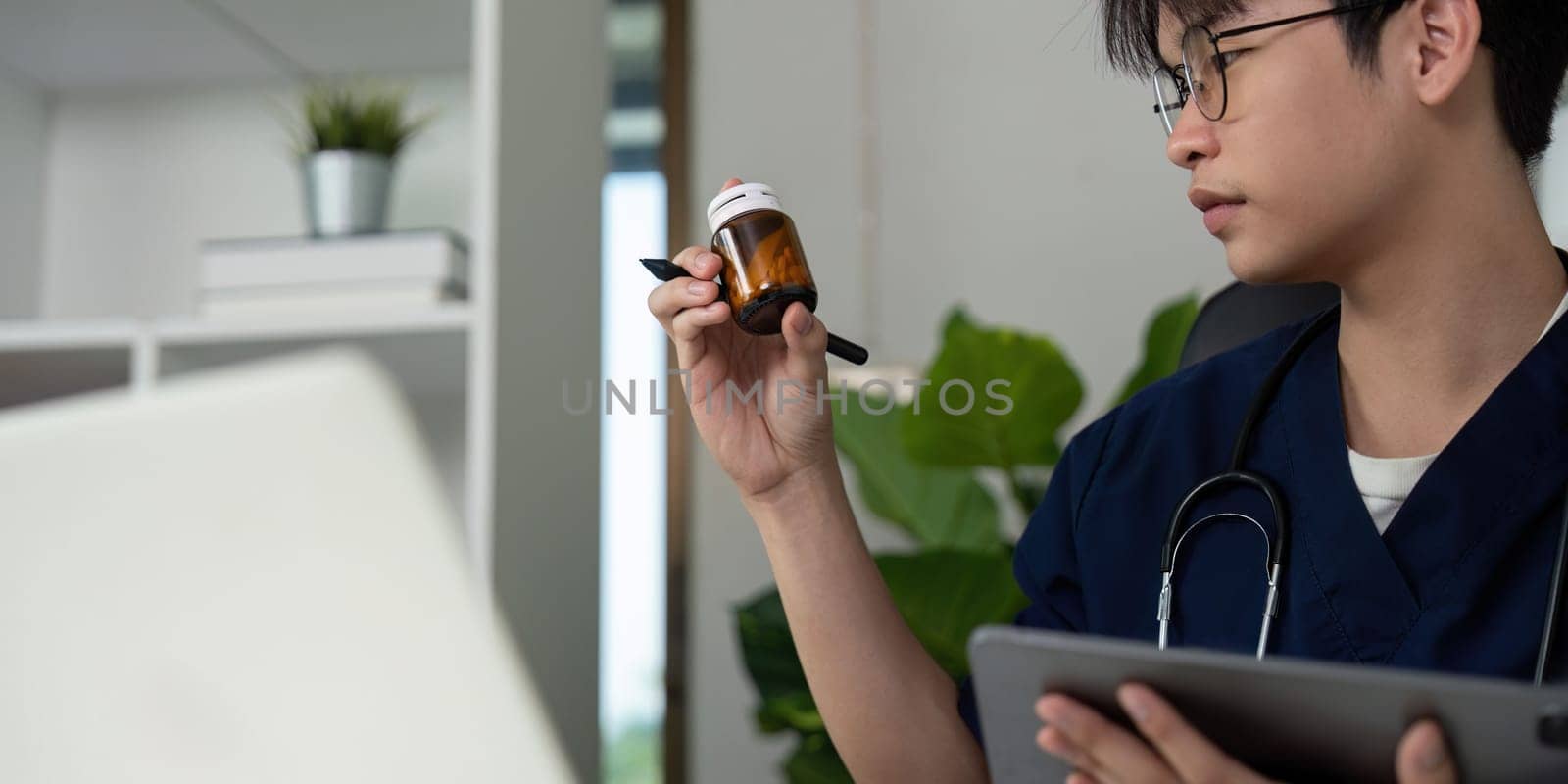 A diligent medical student analyzes medication, showcasing dedication to learning and patient safety.