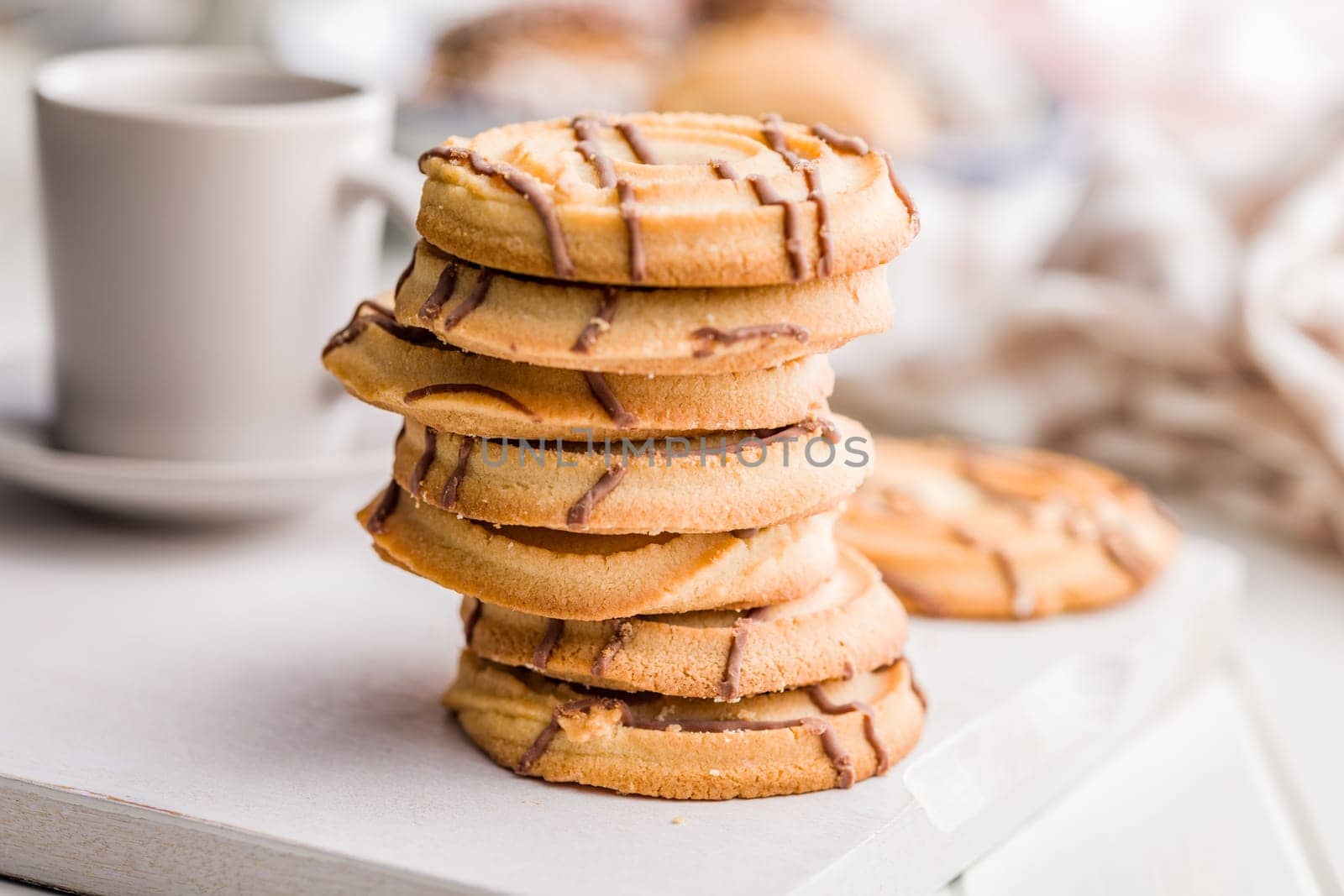 Sweet chocolate cookies on a white table.