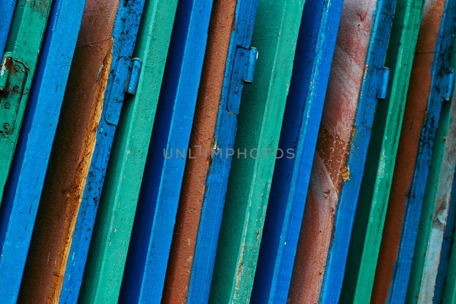 a hinged, sliding, or revolving barrier at the entrance to a building