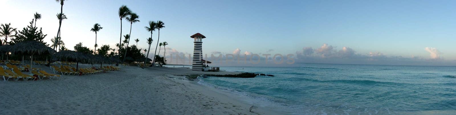 Panoramic beach with lighthouse and beach
