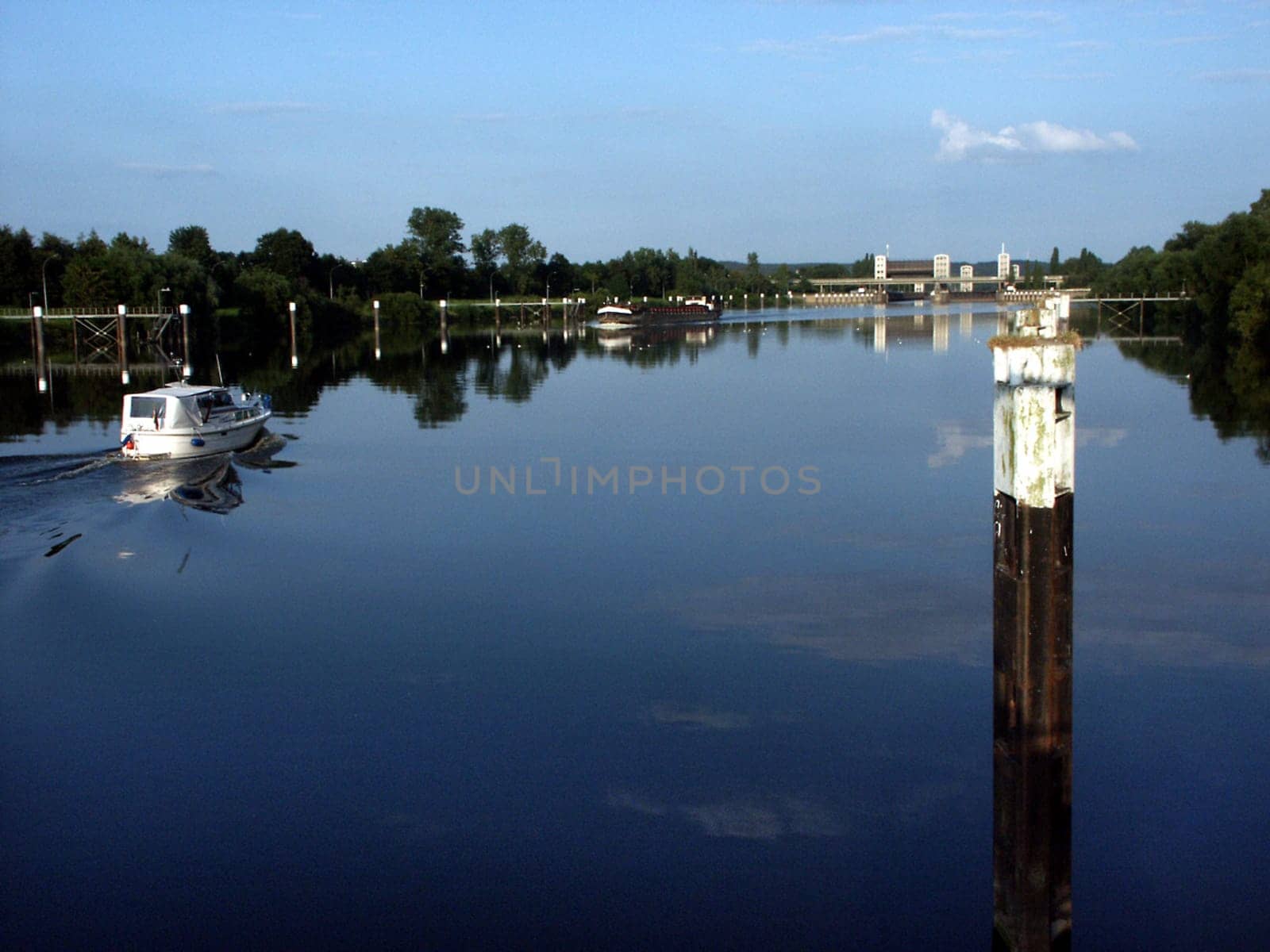 Elbe barge and yacht at the Elbe lock near Geesthacht