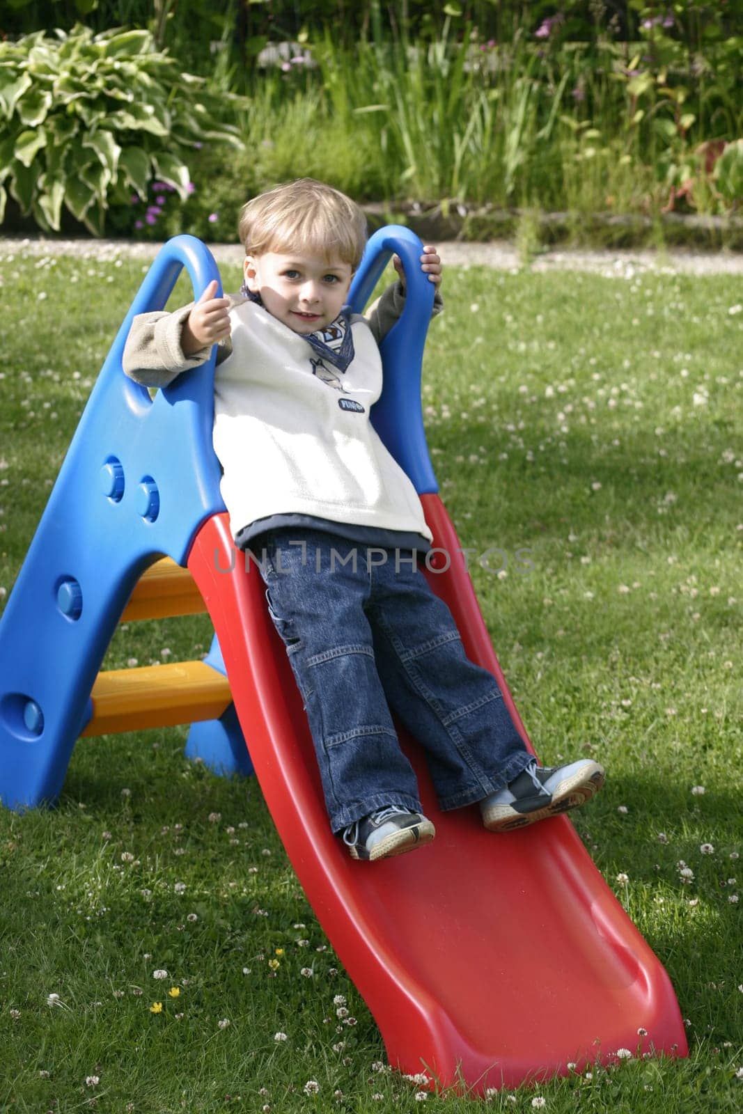 Boy playing with the slide