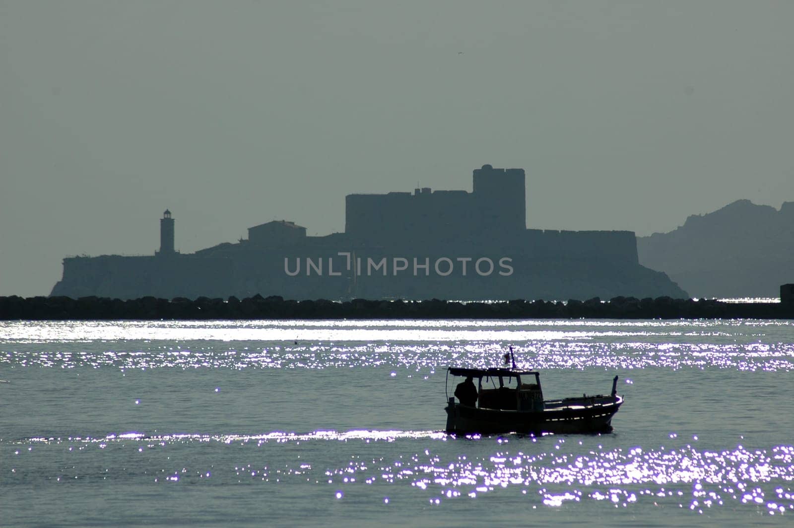 The prison island in the background is the Chateau d'If,known from "The Count of Monte Cristo""."