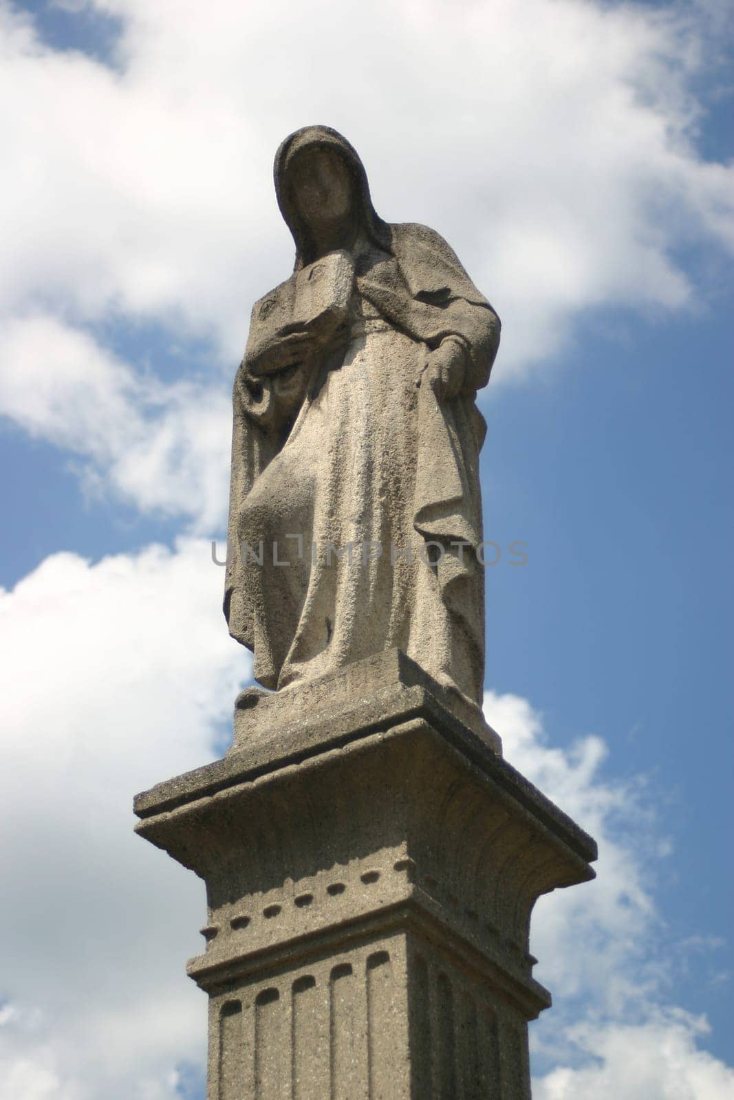 Statue on the eye fountain in Bad Pyrmont. The water of this fountain is said to have a healing effect on eye diseases. Even today,it is common to see people wetting their eyes with the water.