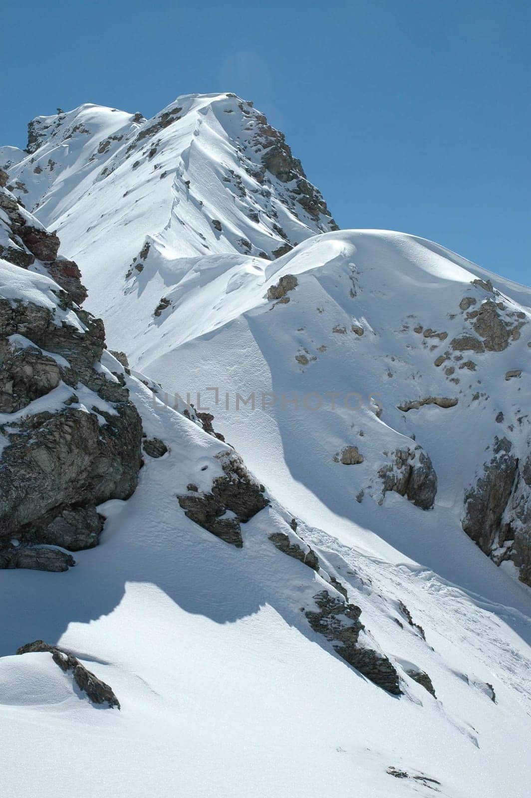 Taken at the Rothorn near Lenzerheide in Switzerland in March 2005. Nikon D70,Nikkor 18-70.